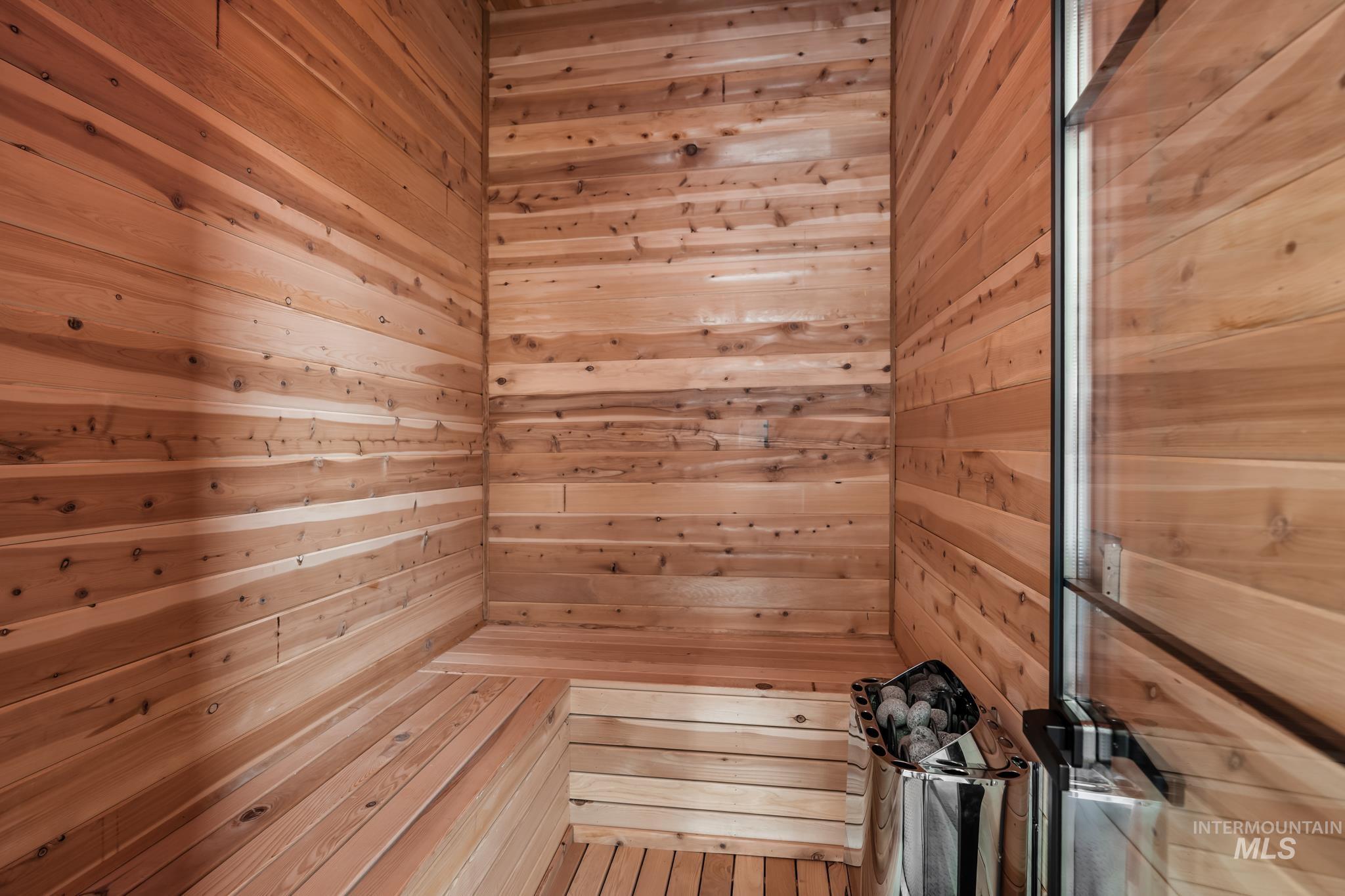 Sauna / steam room with wooden walls