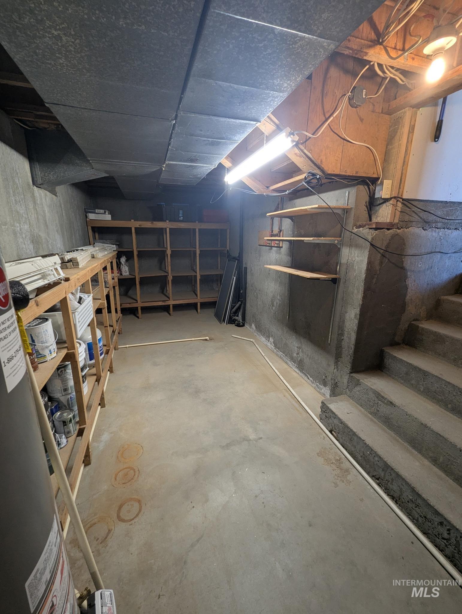 Unfinished below grade area with gas water heater