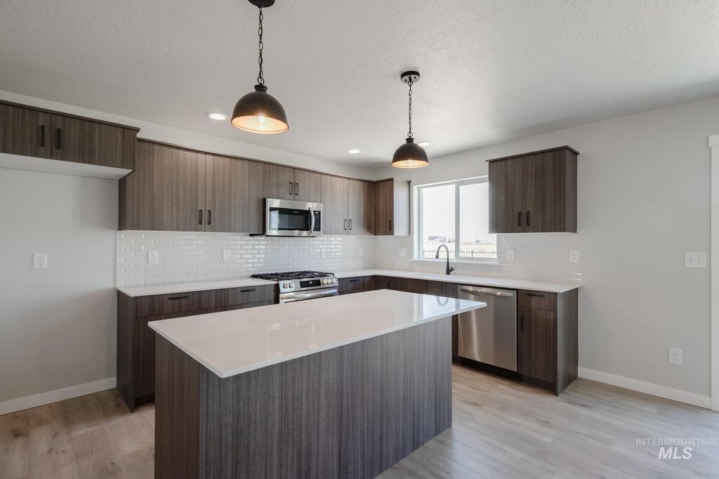 Photo of 6582 W Plateau Creek Dr, Meridian, ID 83646 (MLS # 98984747)