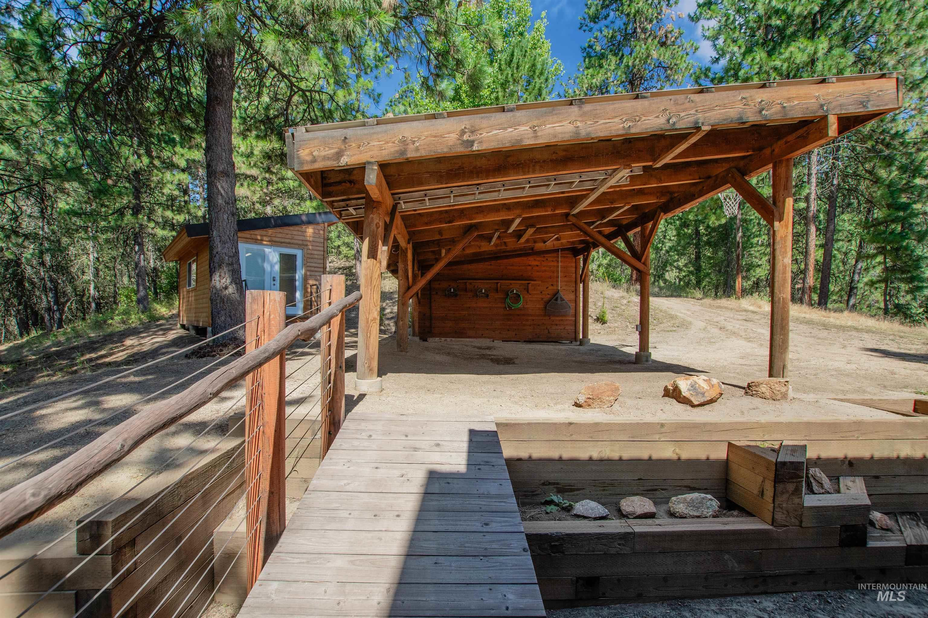 Wooden terrace with an outbuilding