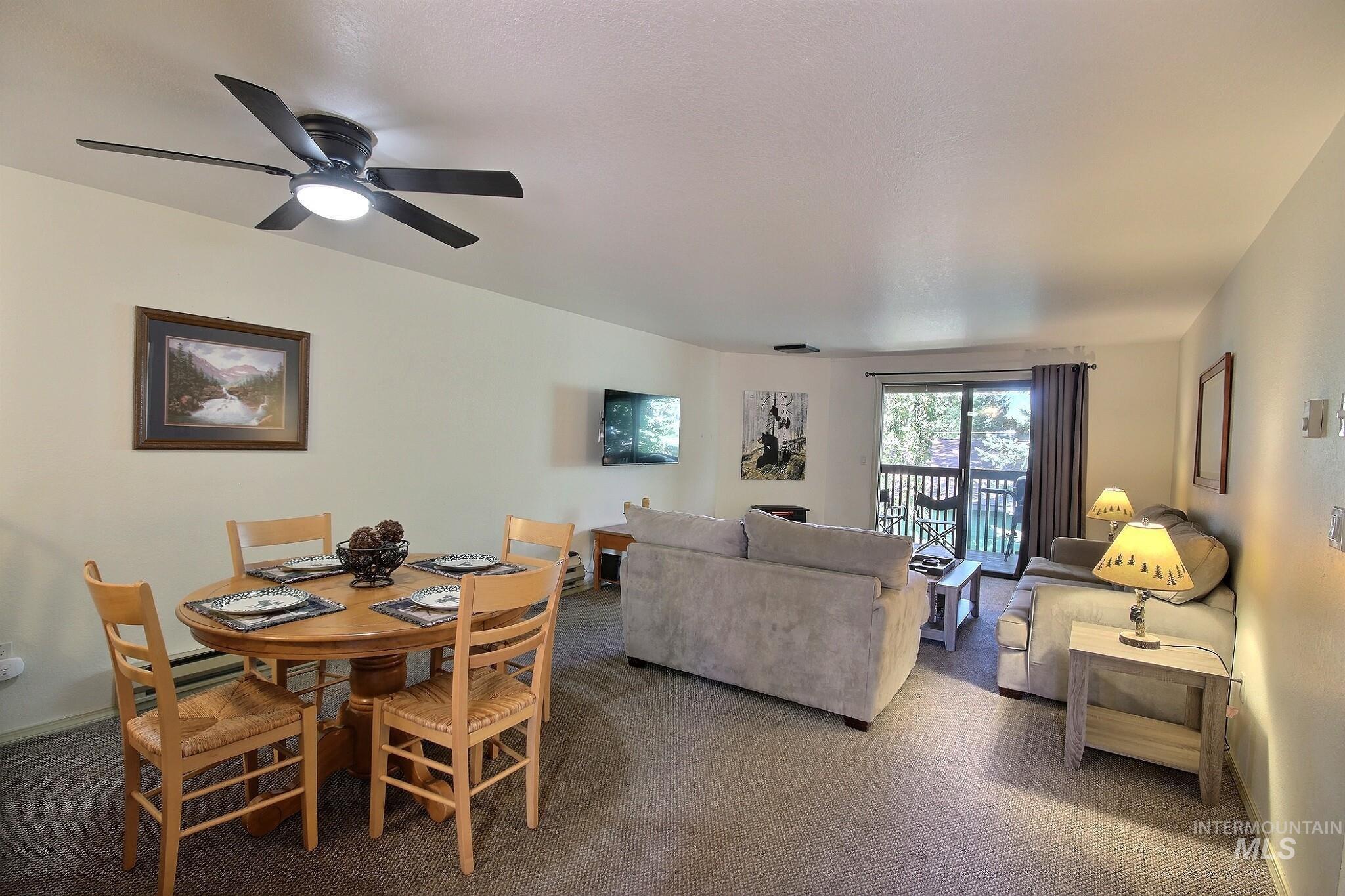 Dining space featuring carpet flooring
