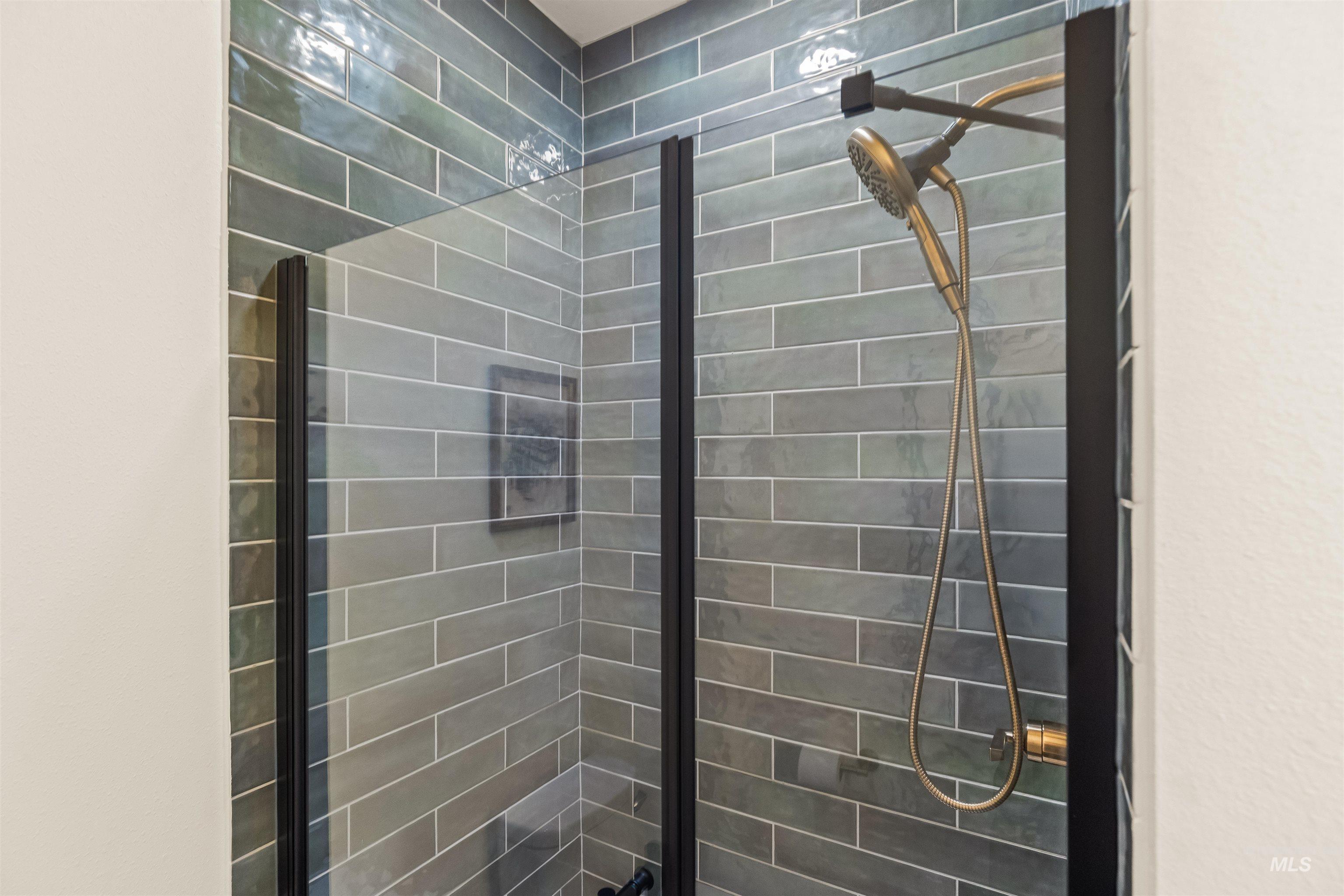 Full bath with a shower stall