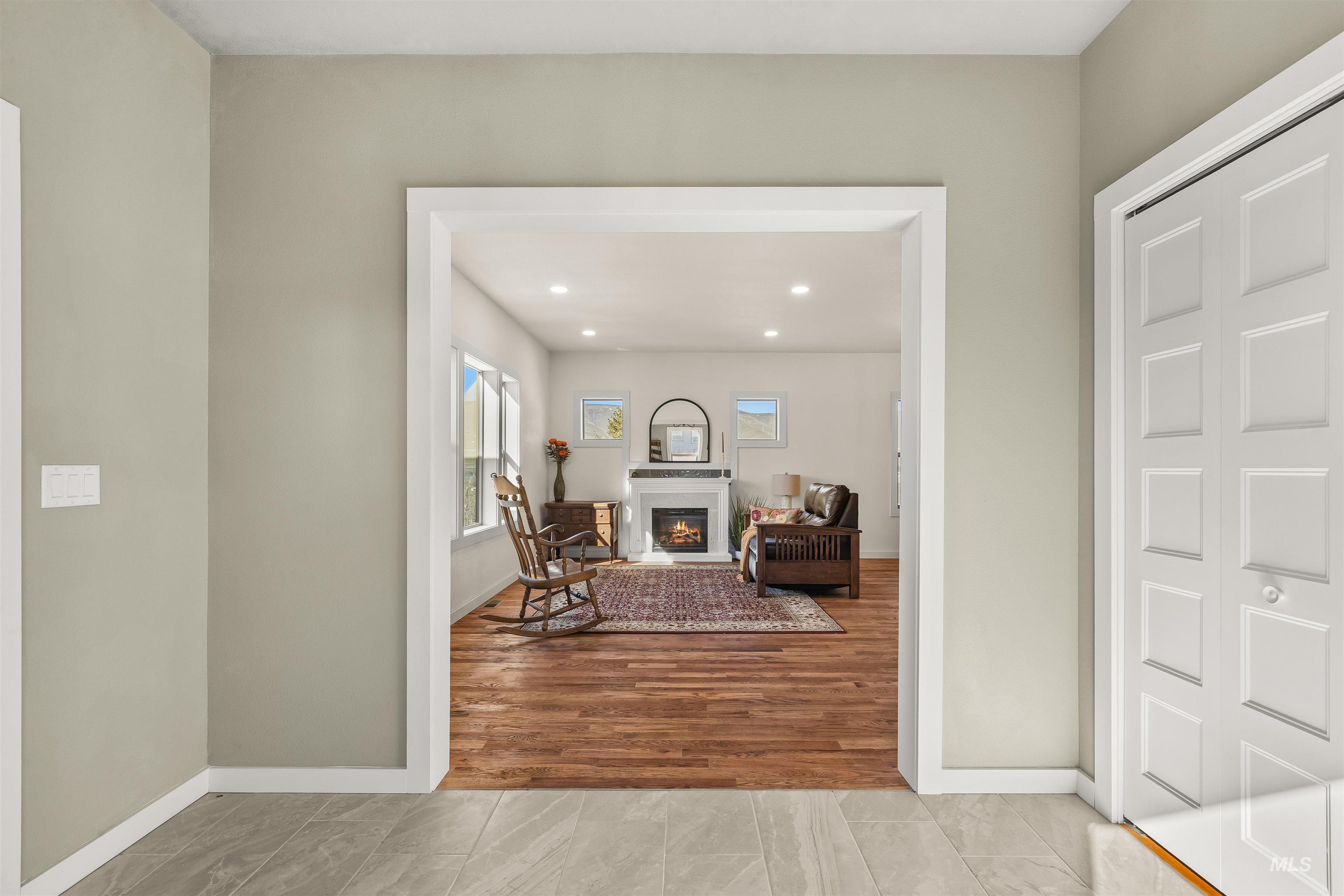 Hall featuring recessed lighting and light wood-style flooring