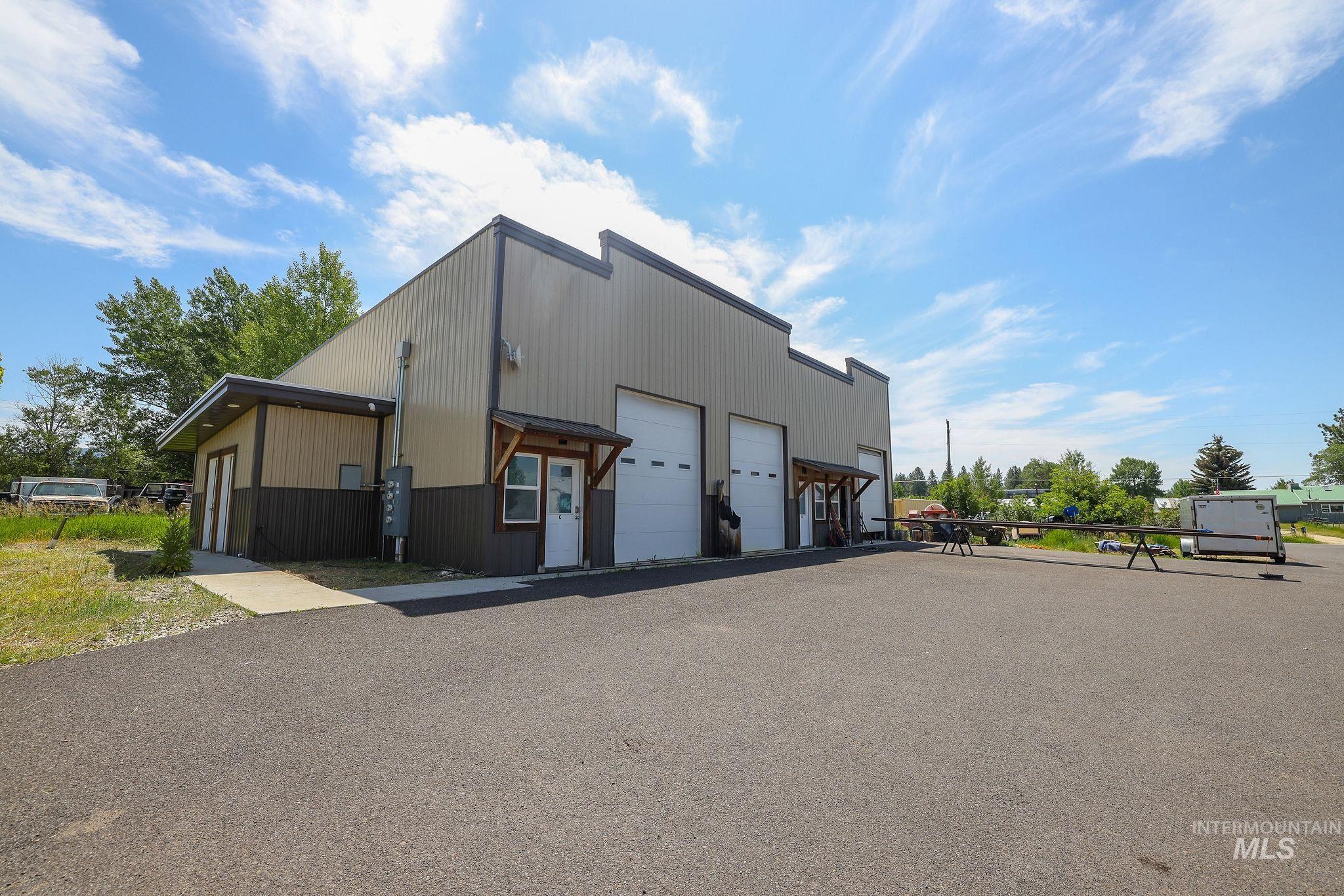 View of building exterior with a garage