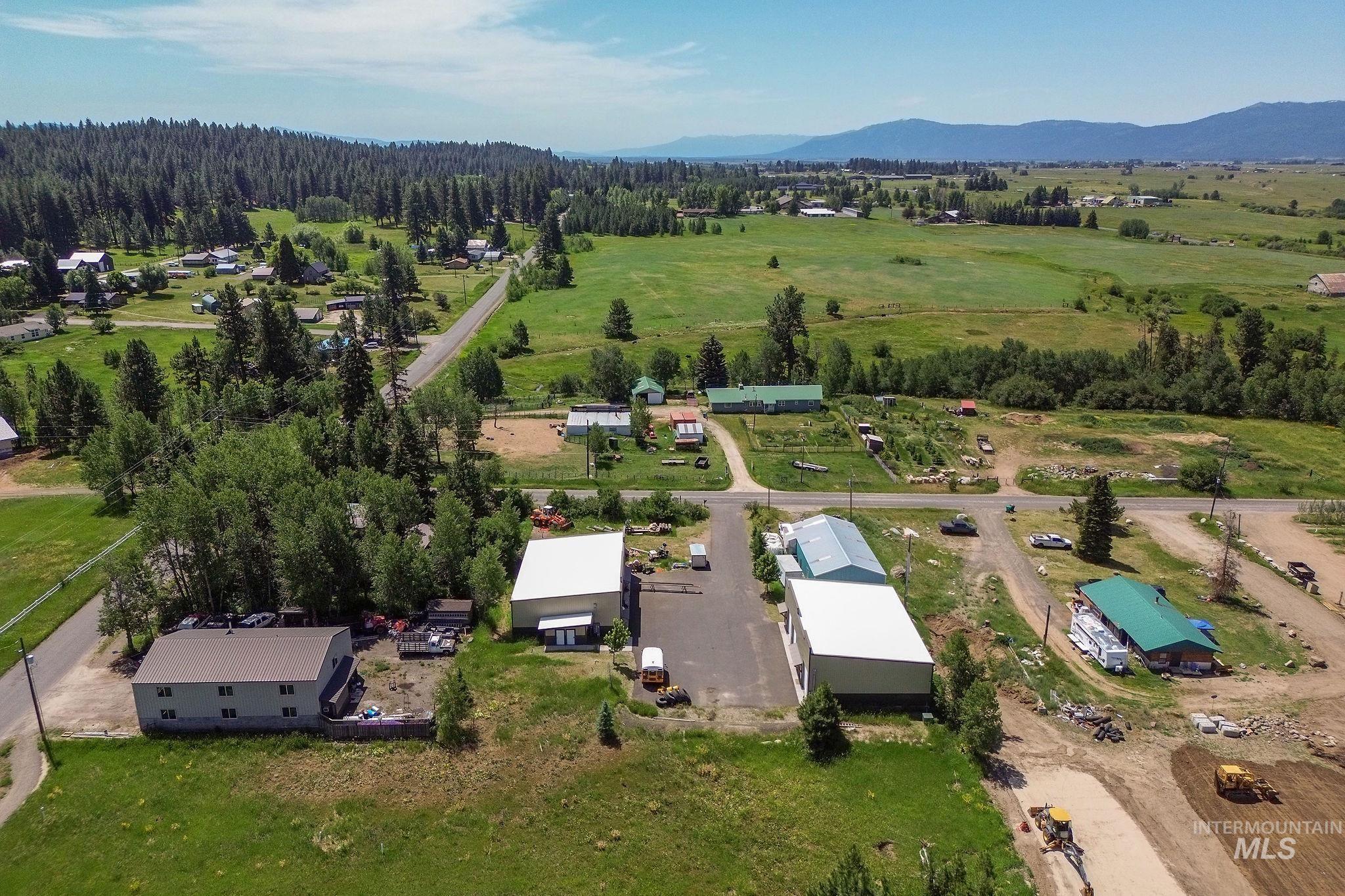 Aerial view of sparsely populated area featuring a mountain backdrop
