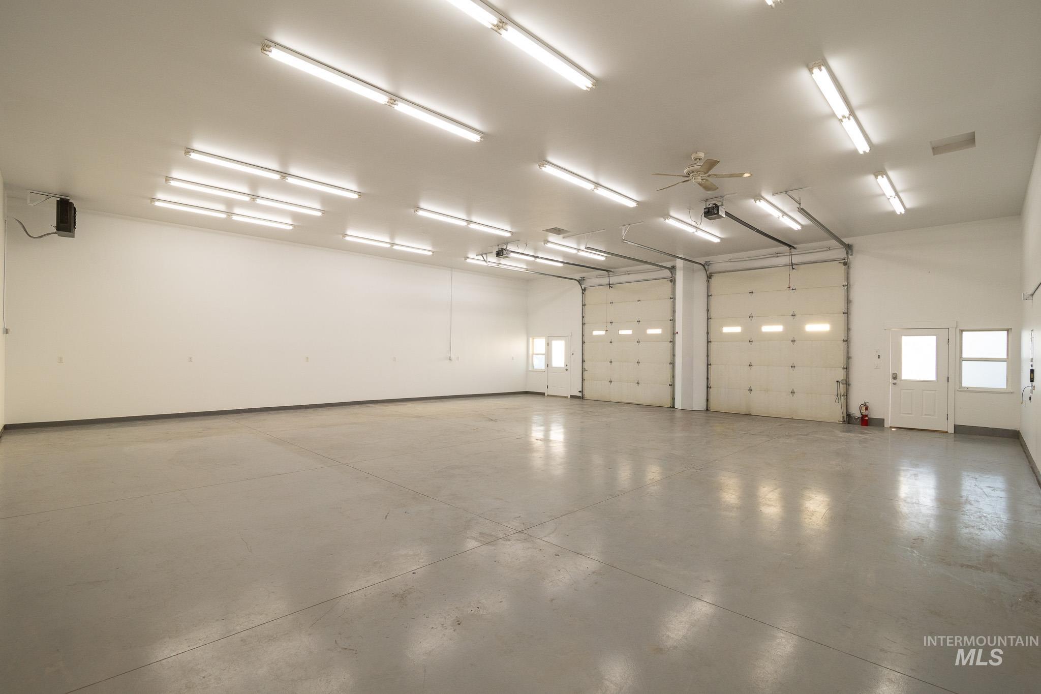 Garage featuring ceiling fan
