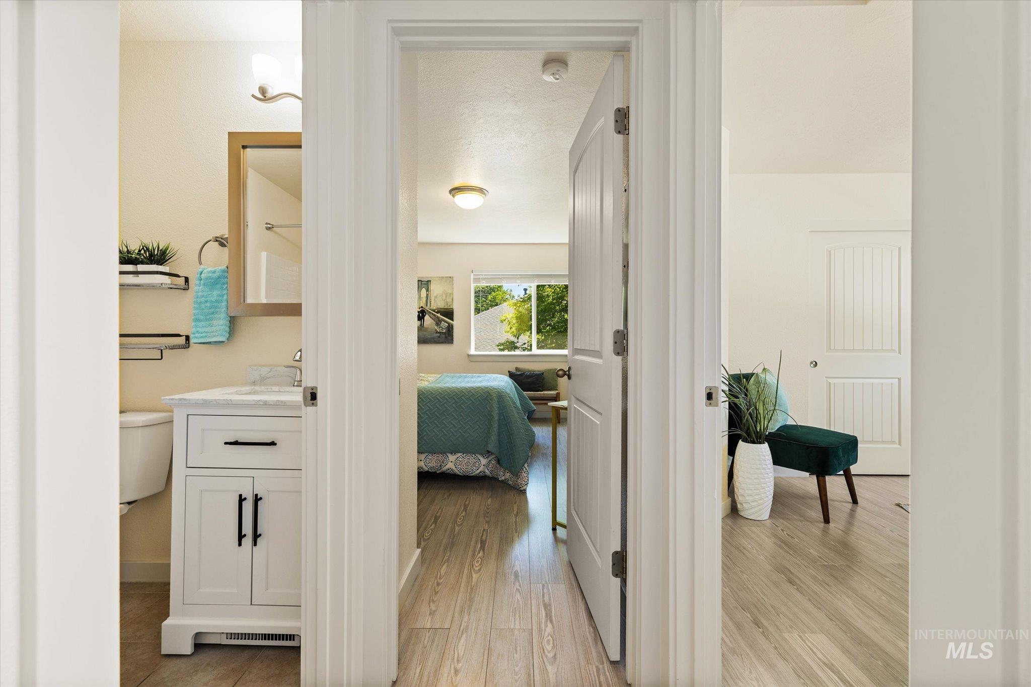 Hall featuring light wood-style floors