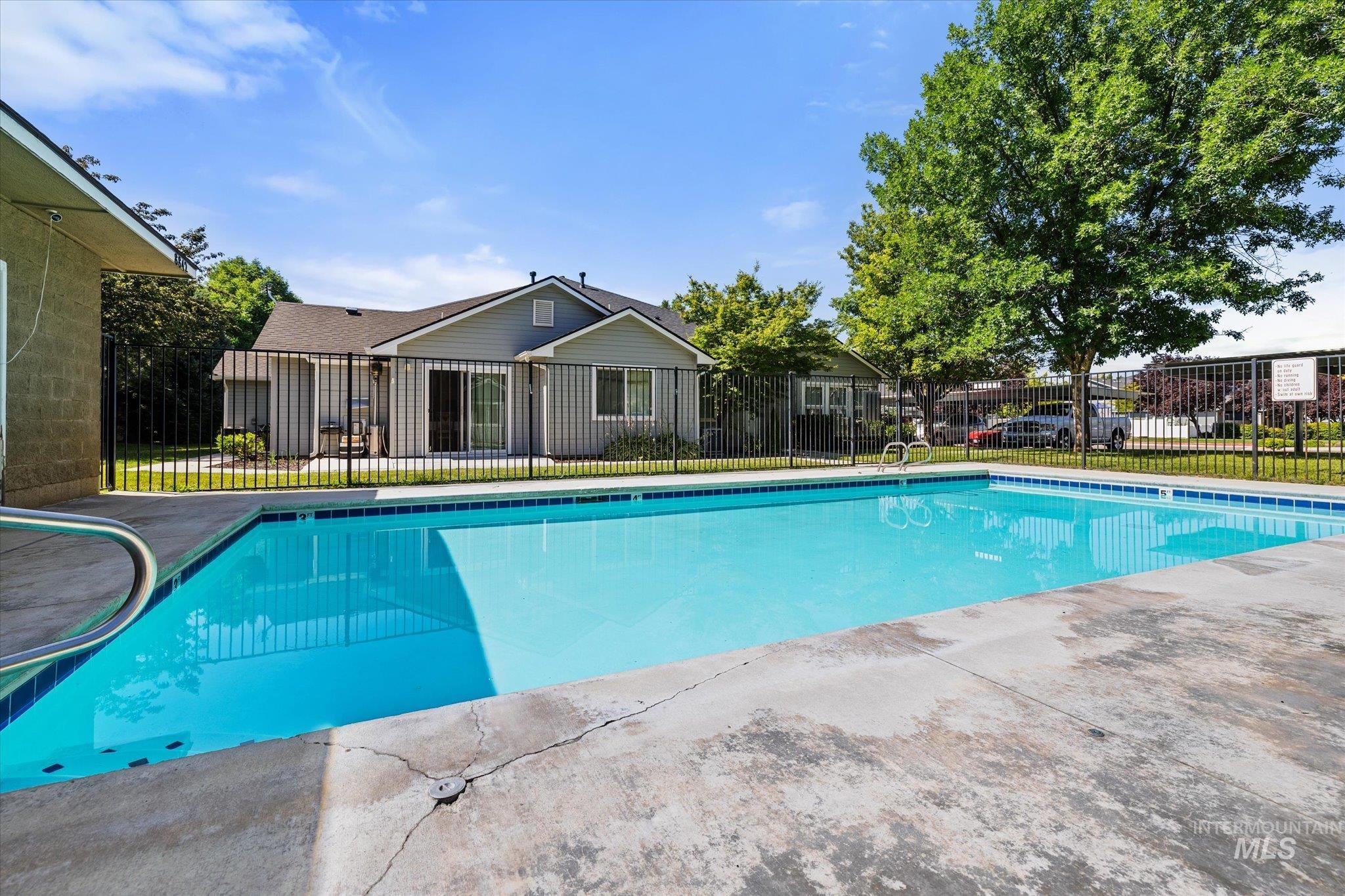 View of pool with a patio area