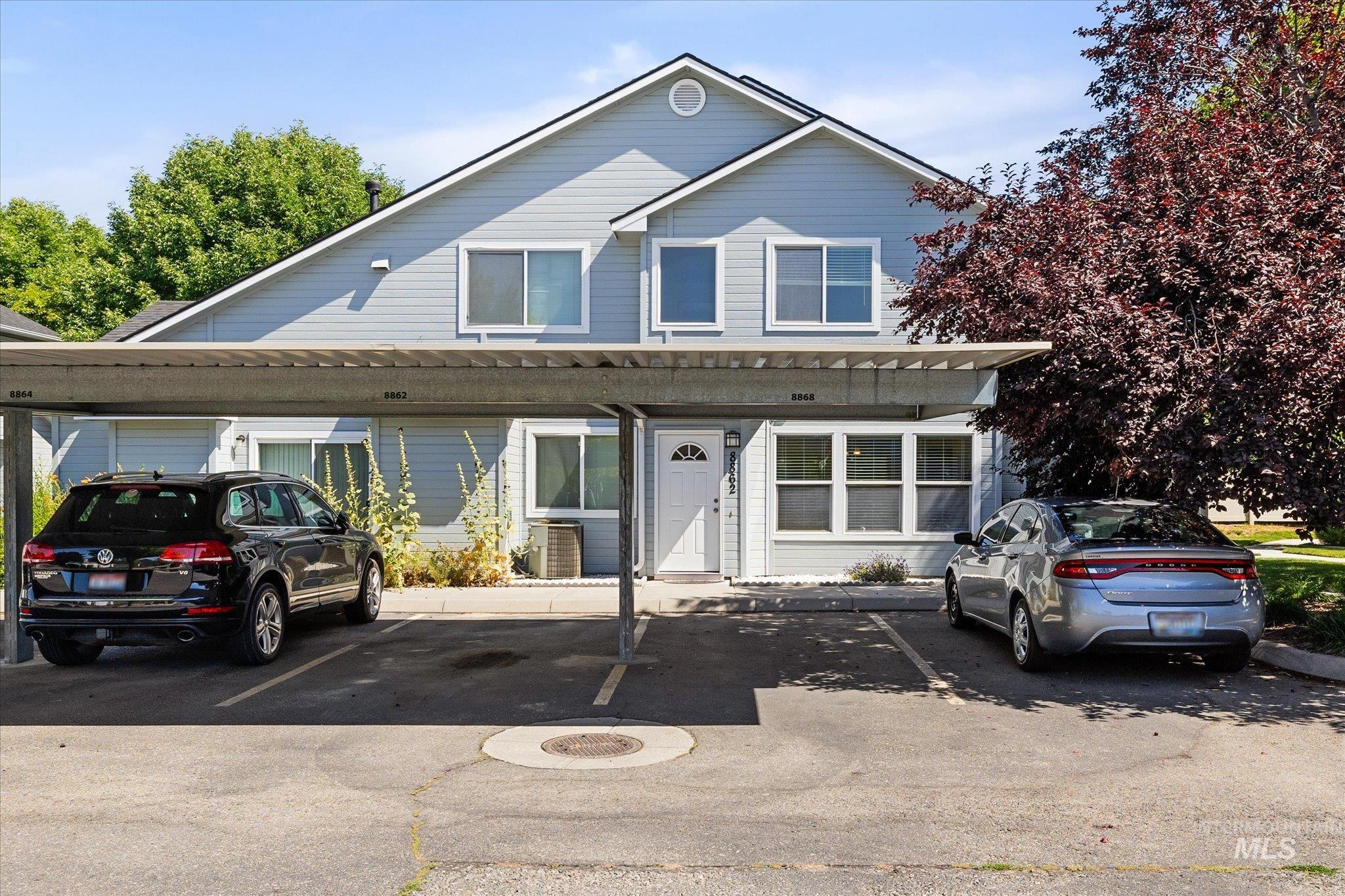 View of front of home featuring covered parking