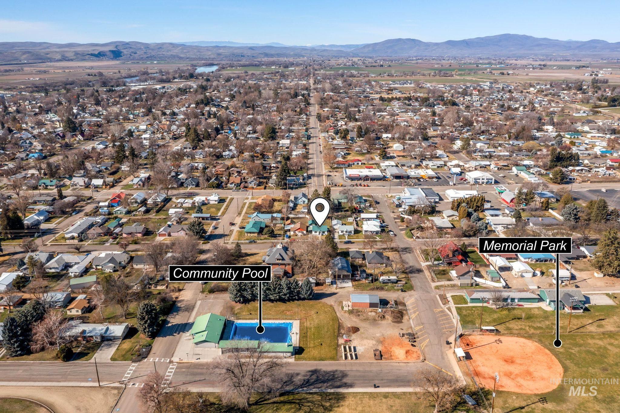 View of property location with nearby suburban area and a mountainous background