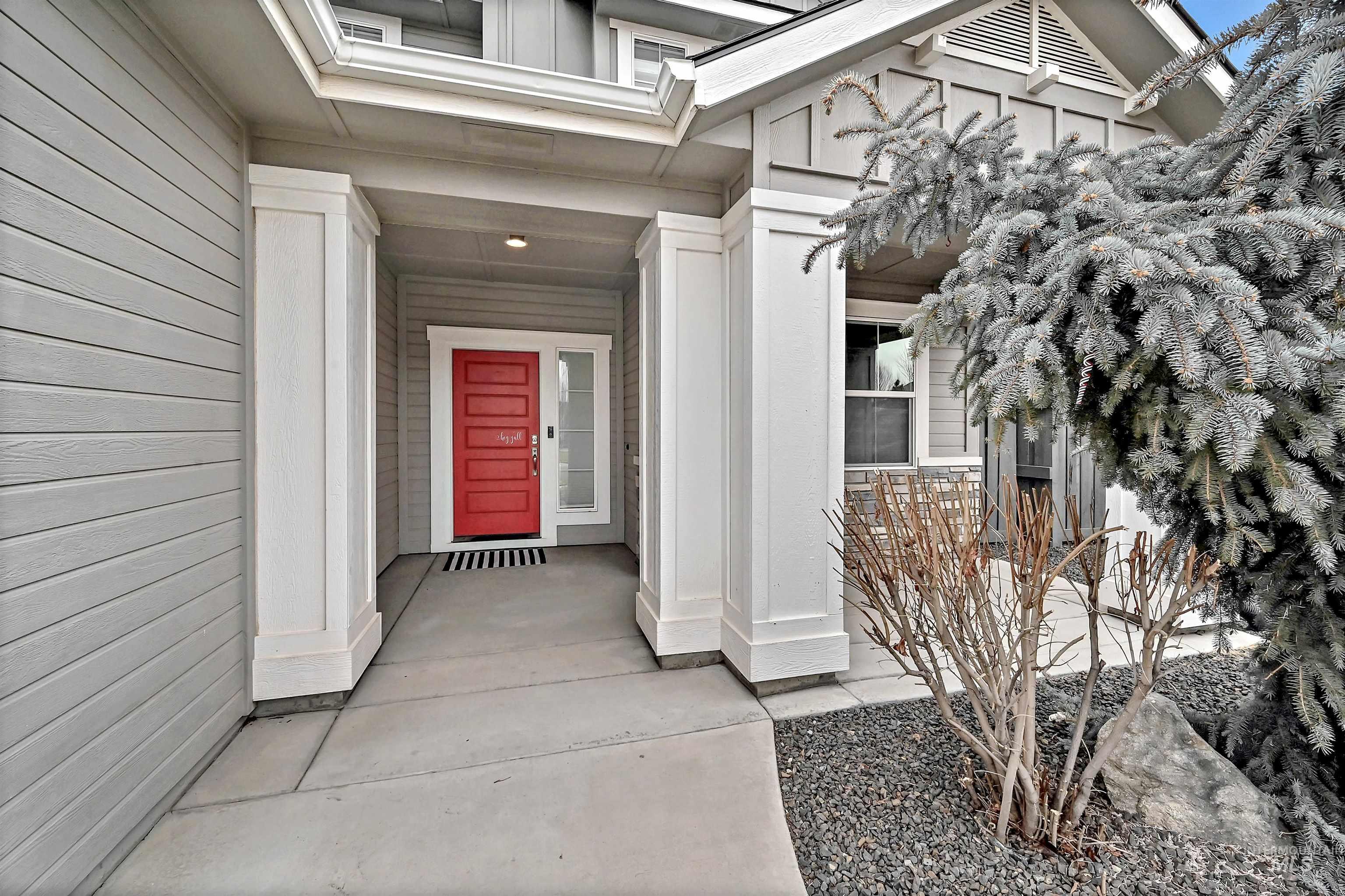 View of covered exterior front entry