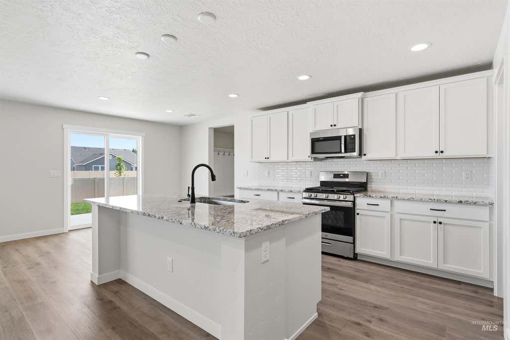 Photo of 1590 Witt St, Mountain Home, ID 83647 (MLS # 98955147)