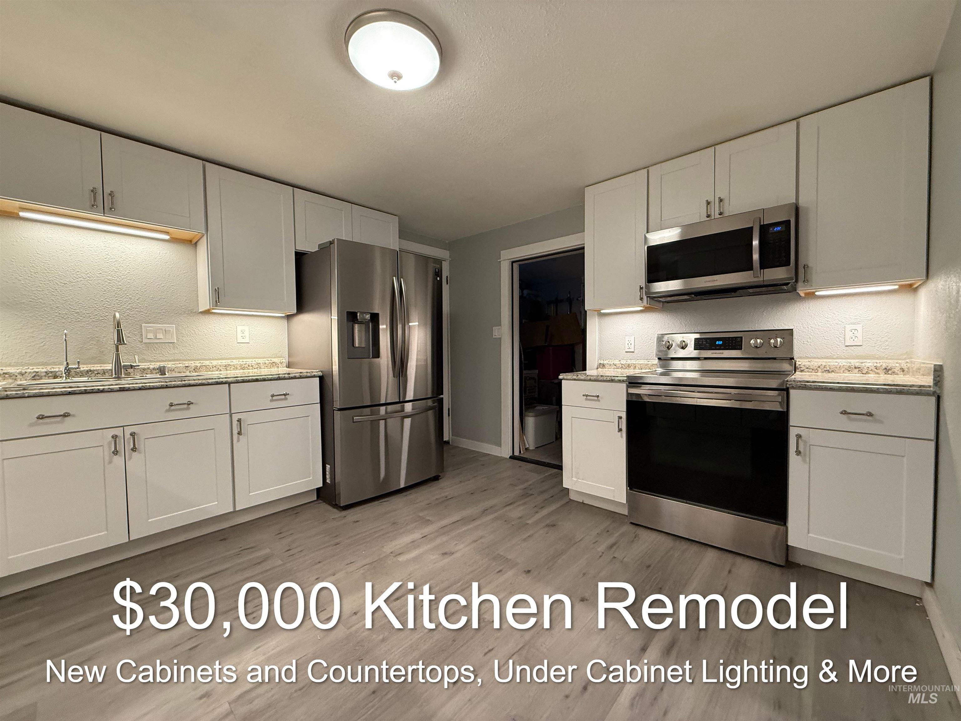 $30,000 Kitchen Remodel - New Cabinetry & Counter tops, New Under Cabinet Lighting, Samsung Stainless Steel Appliances, Built-In Microwave, New LVP Flooring, Reverse Osmosis Water Filtration, New Baseboards, New Garbage Disposal, Freshly Painted & More.