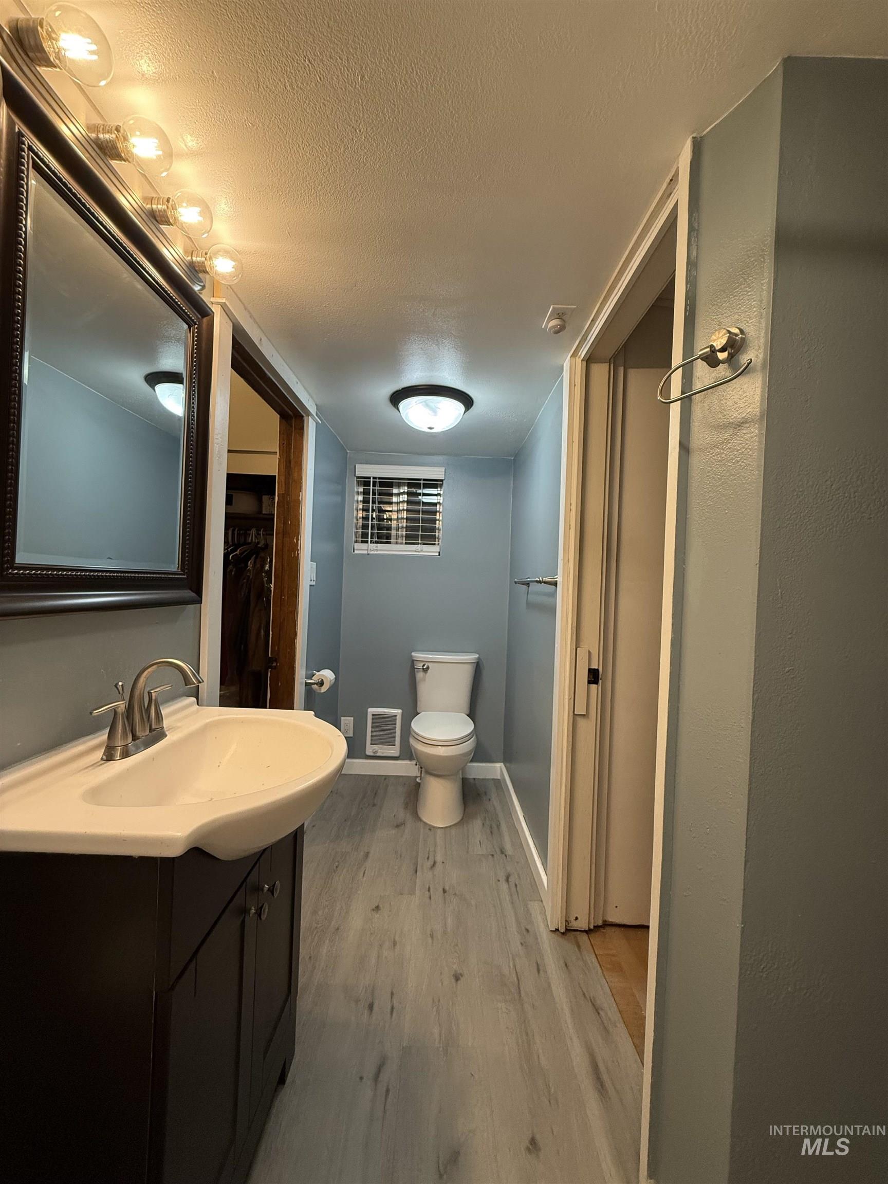 $8,000 Bathroom Remodel - Newer Tub/Shower, Moen Banbury Water Fixtures and Hardware, New Light Fixtures, New LVP Flooring, Freshly Painted, New Mirrored Medicine Cabinet, Elongated Super Flush Toilet, 2.5 inch Faux Wood Blind, New In-Wall Heater & More.