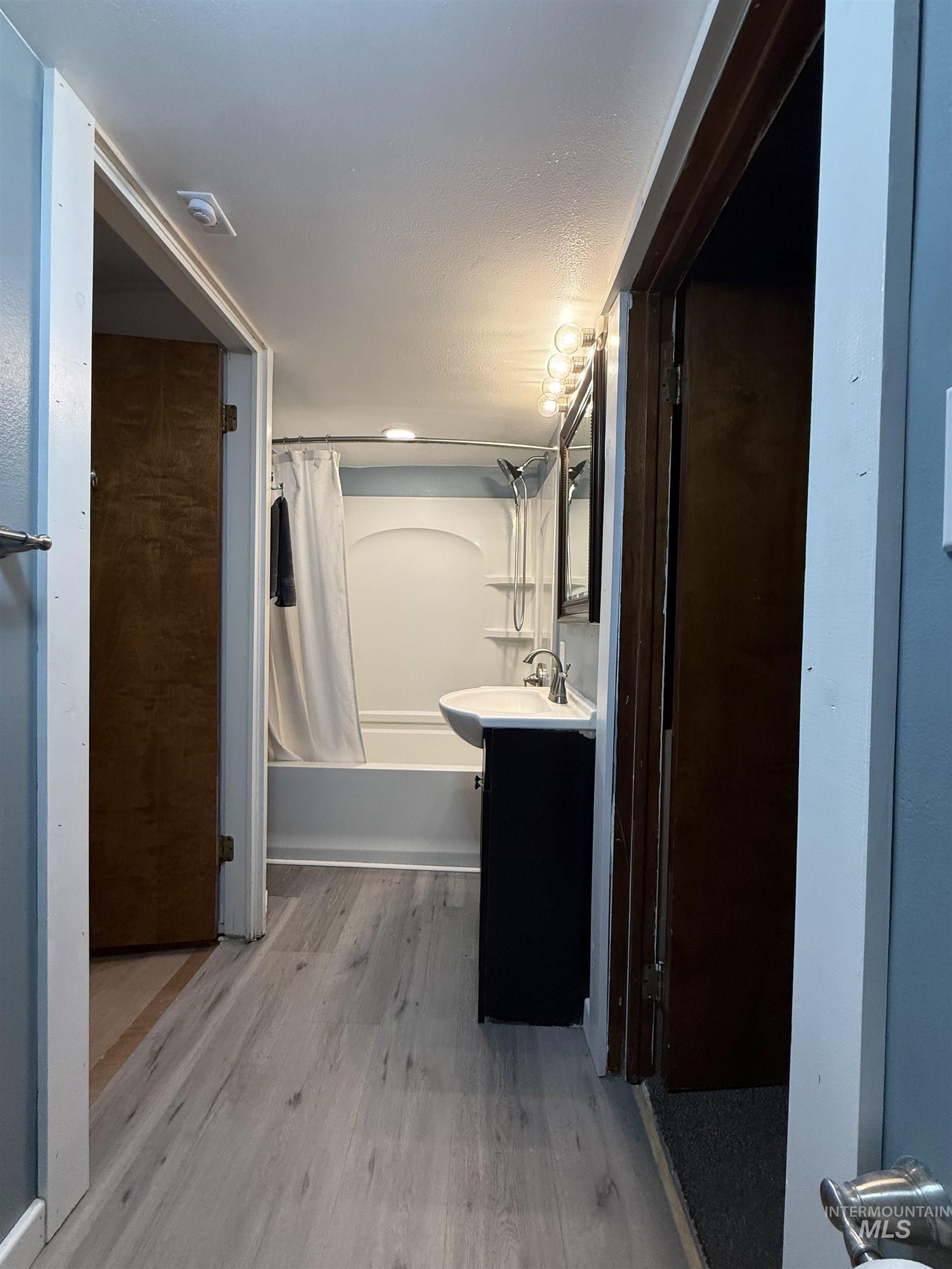 $8,000 Bathroom Remodel - Newer Tub/Shower, Moen Banbury Water Fixtures and Hardware, New Light Fixtures, New LVP Flooring, Freshly Painted, New Mirrored Medicine Cabinet, Elongated Super Flush Toilet, 2.5 inch Faux Wood Blind, New In-Wall Heater & More.