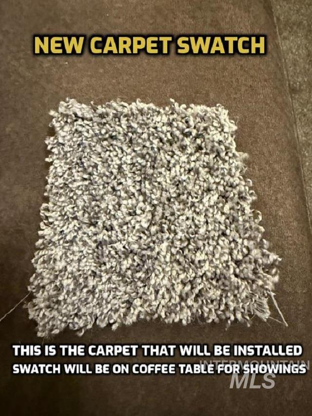 This is a swatch of the carpet that will be installed during the 14 day seller lease back period.  New Carpet and Upgraded Padding will be installed in the following rooms:  Living Room, Master Bedroom, Master Walk-In Closet and Bedroom 2.