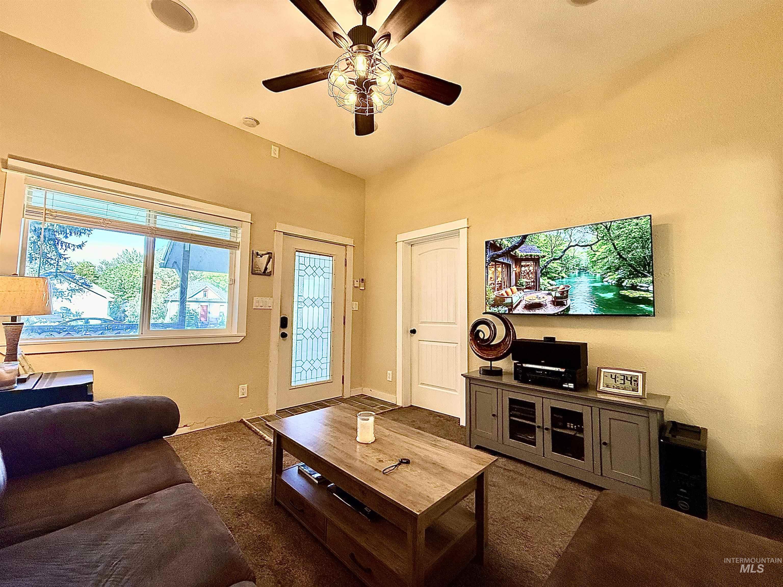 $11,500 Living Room Remodel -NEW CARPET AND PAD WILL BE INSTALLED DURING 14 DAY SELLER LEASE BACK), Leaded Glass Entry Door, Storm Door, Surround Sound, Ceiling Fan, Tile Floor Entry, Pellet Stove recently serviced, (TILE PAD BEING INSTALLED), Ethernet