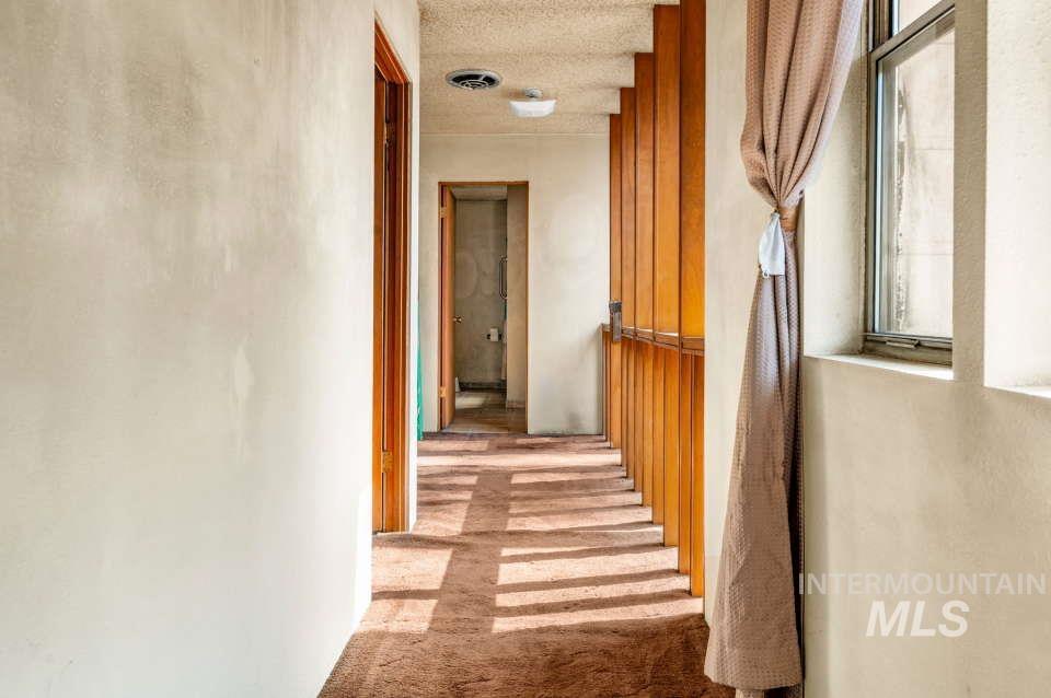 Hall with carpet flooring