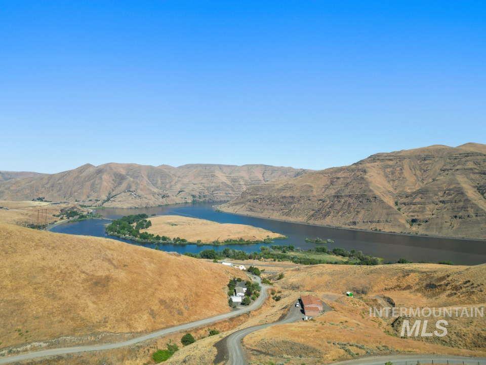 View of mountain backdrop featuring a large body of water