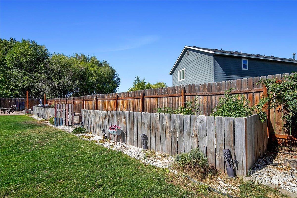 View of fenced backyard
