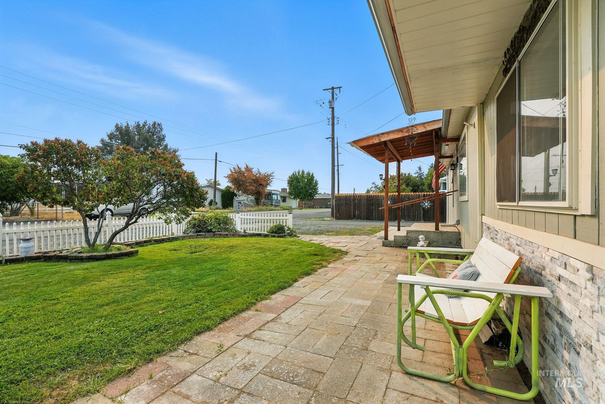 Fenced backyard featuring a patio area