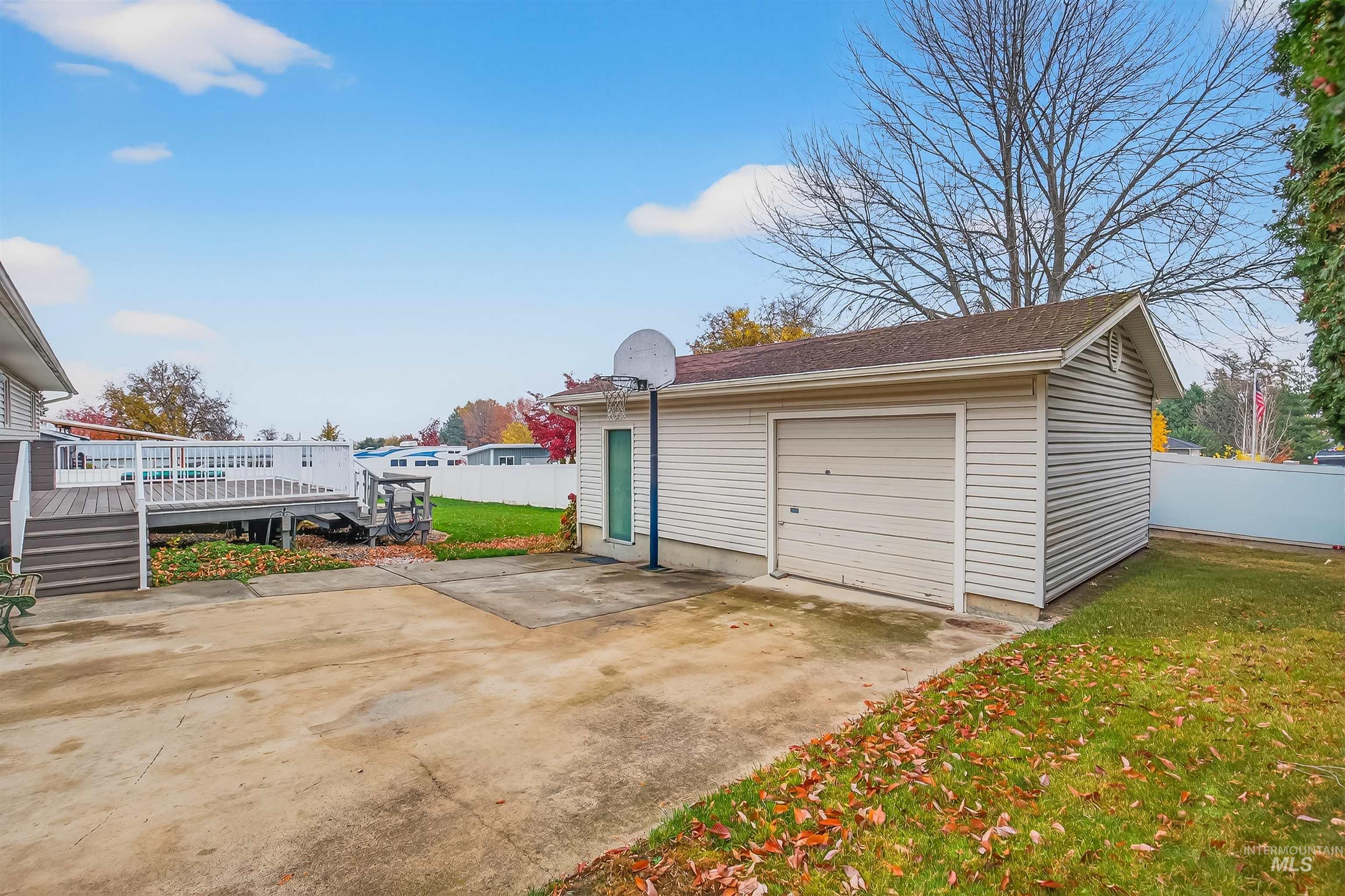 Garage featuring driveway
