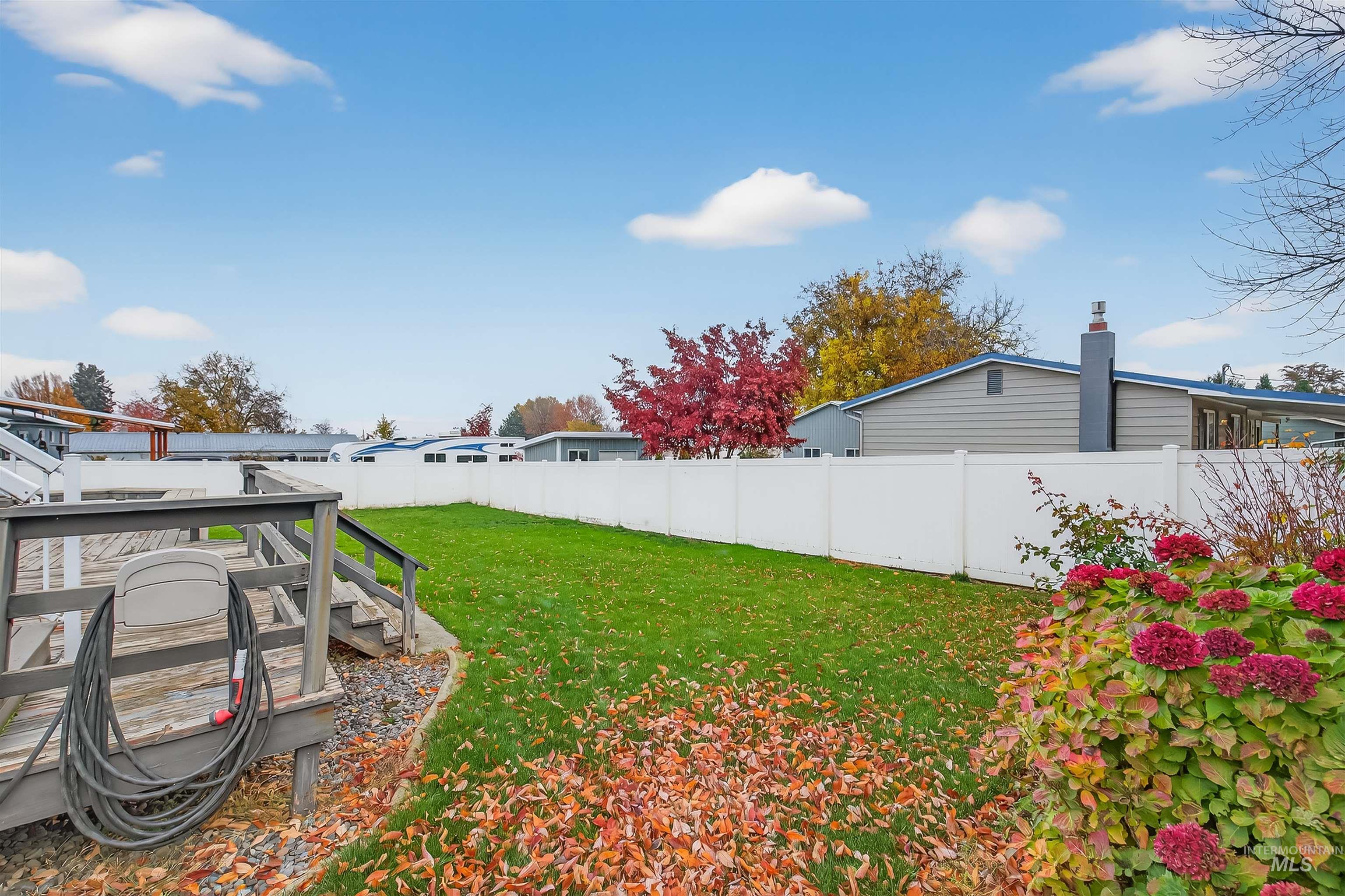 View of fenced backyard