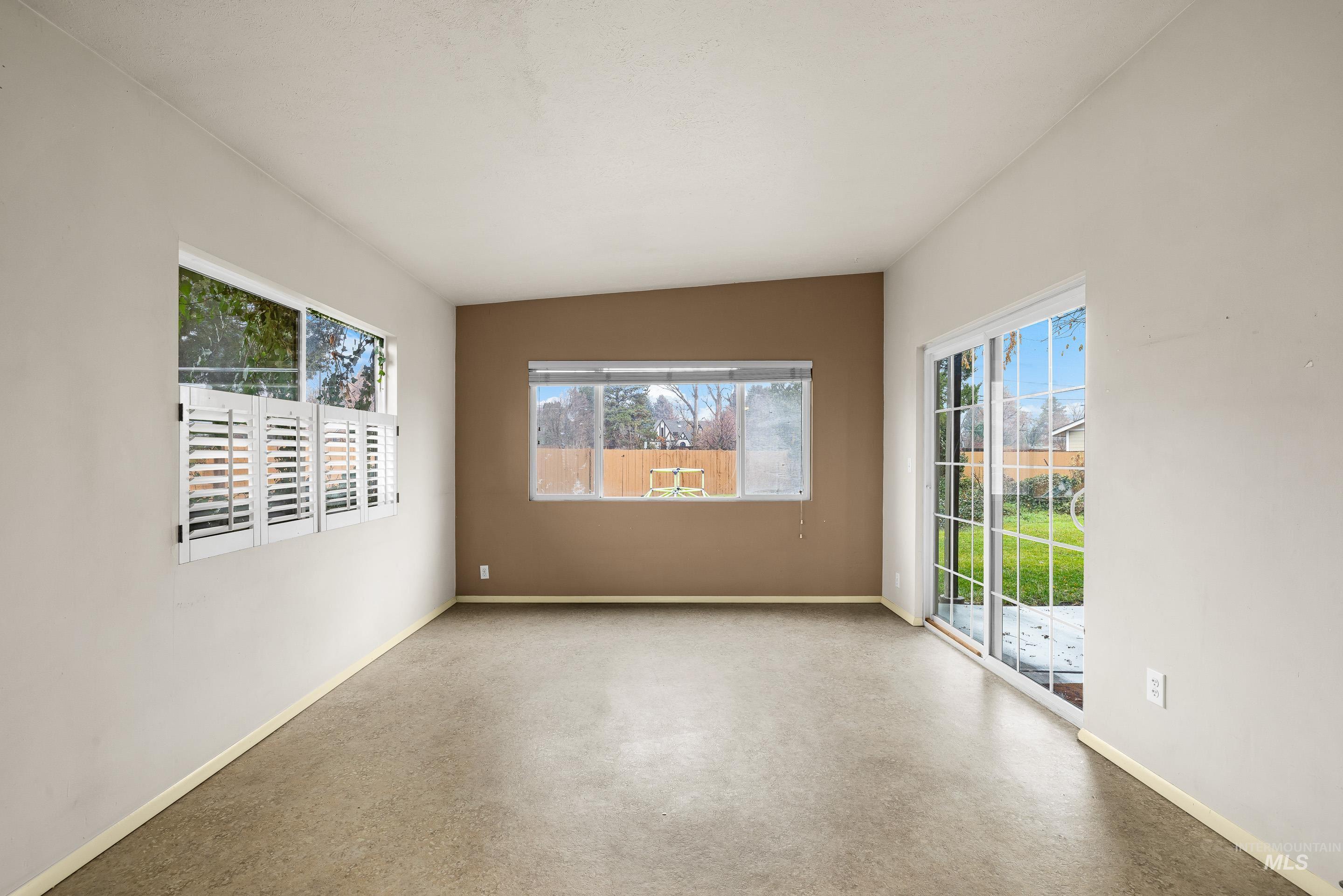 Spare room featuring plenty of natural light