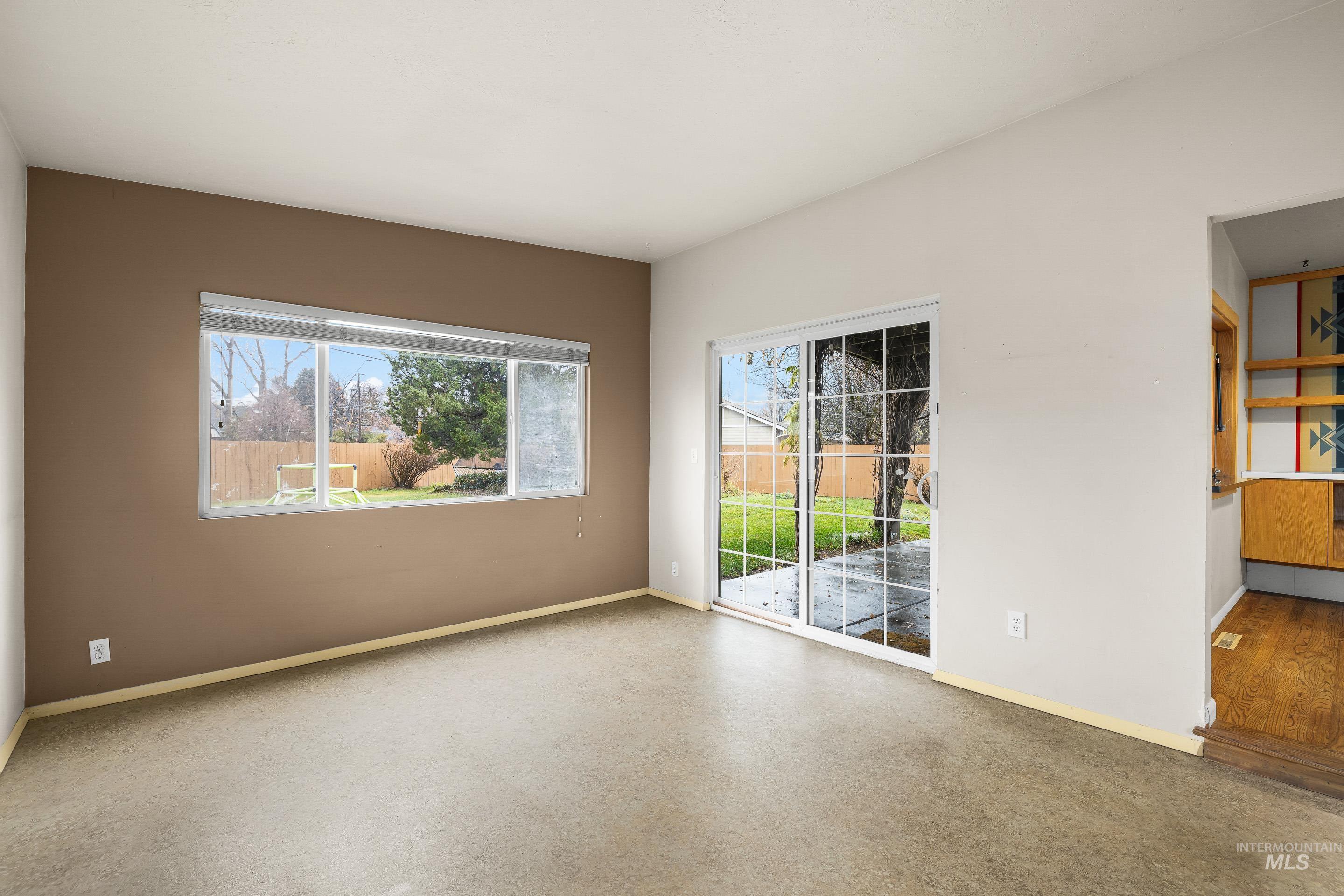 Empty room with baseboards