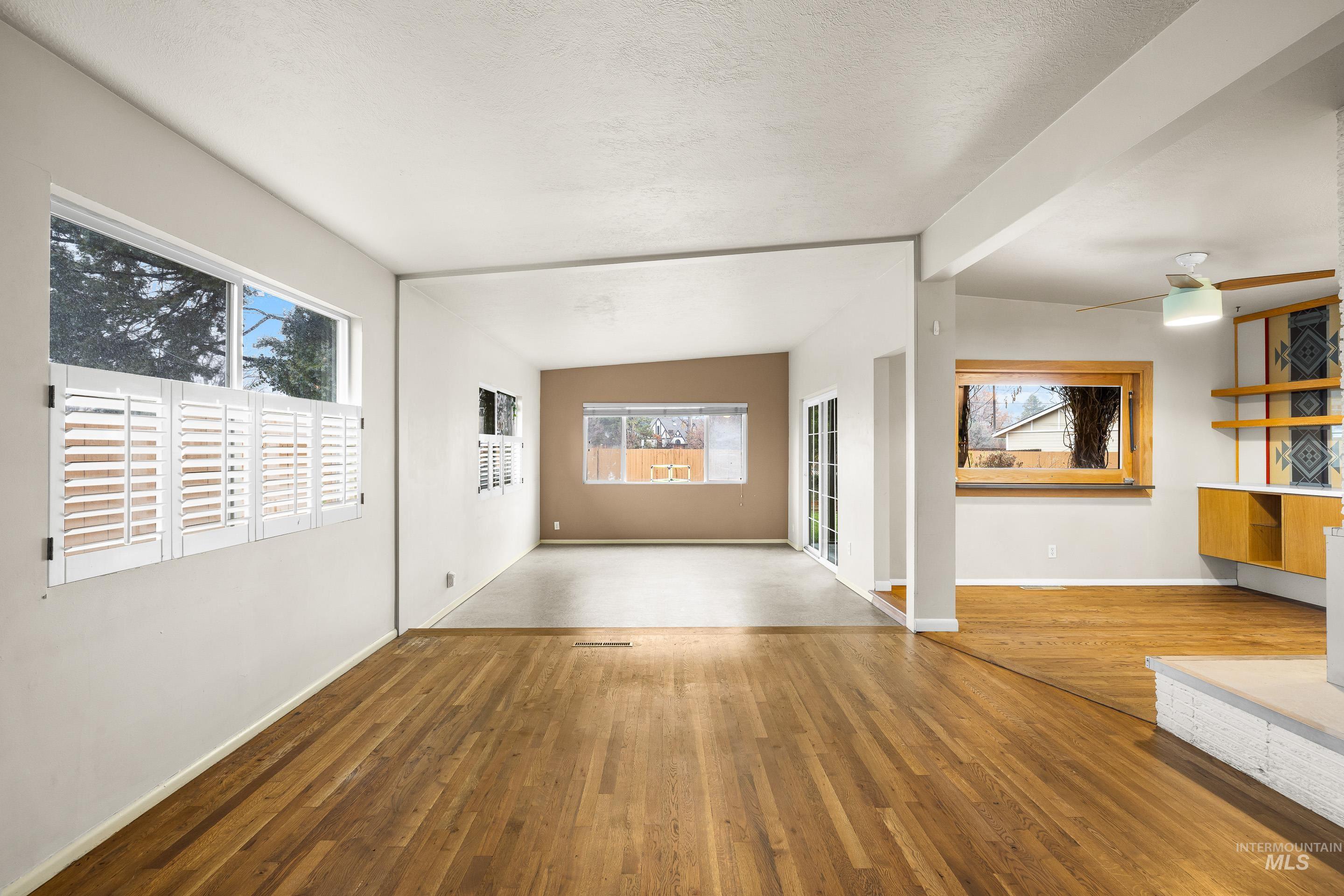 Foyer with wood-type flooring and plenty of natural light