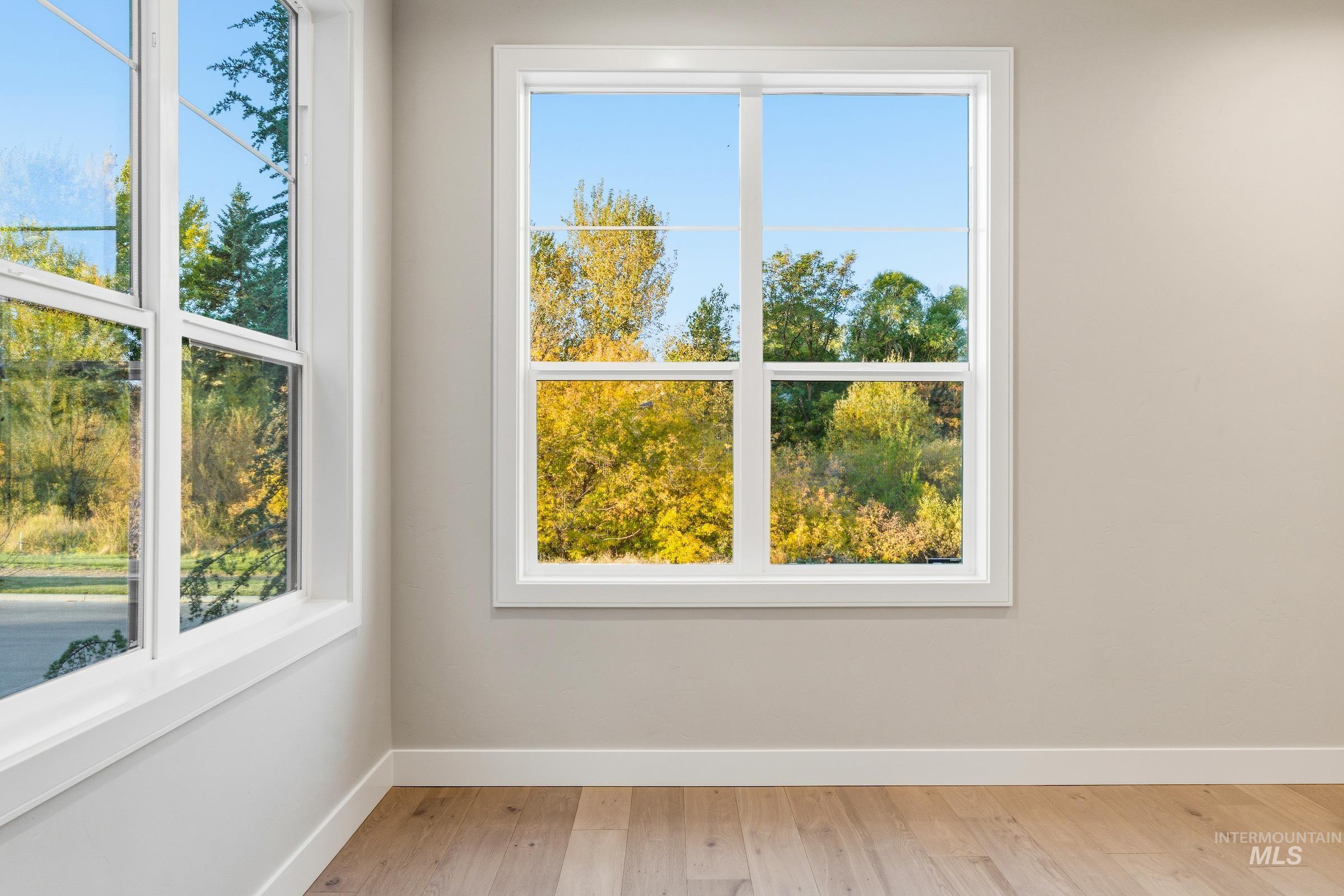 Detailed view of wood finished floors and baseboards