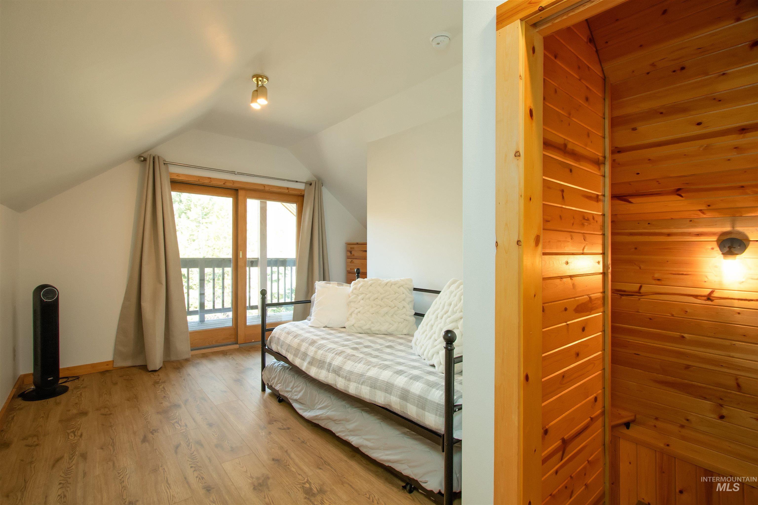Living area with light wood-style flooring