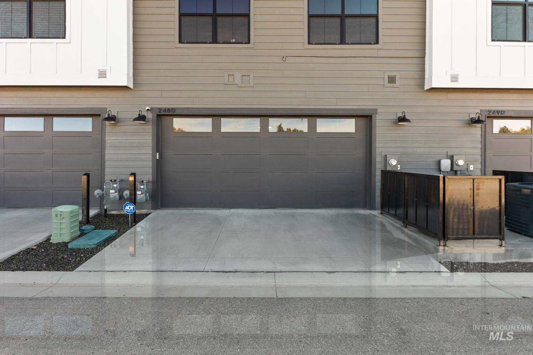 Garage with concrete driveway