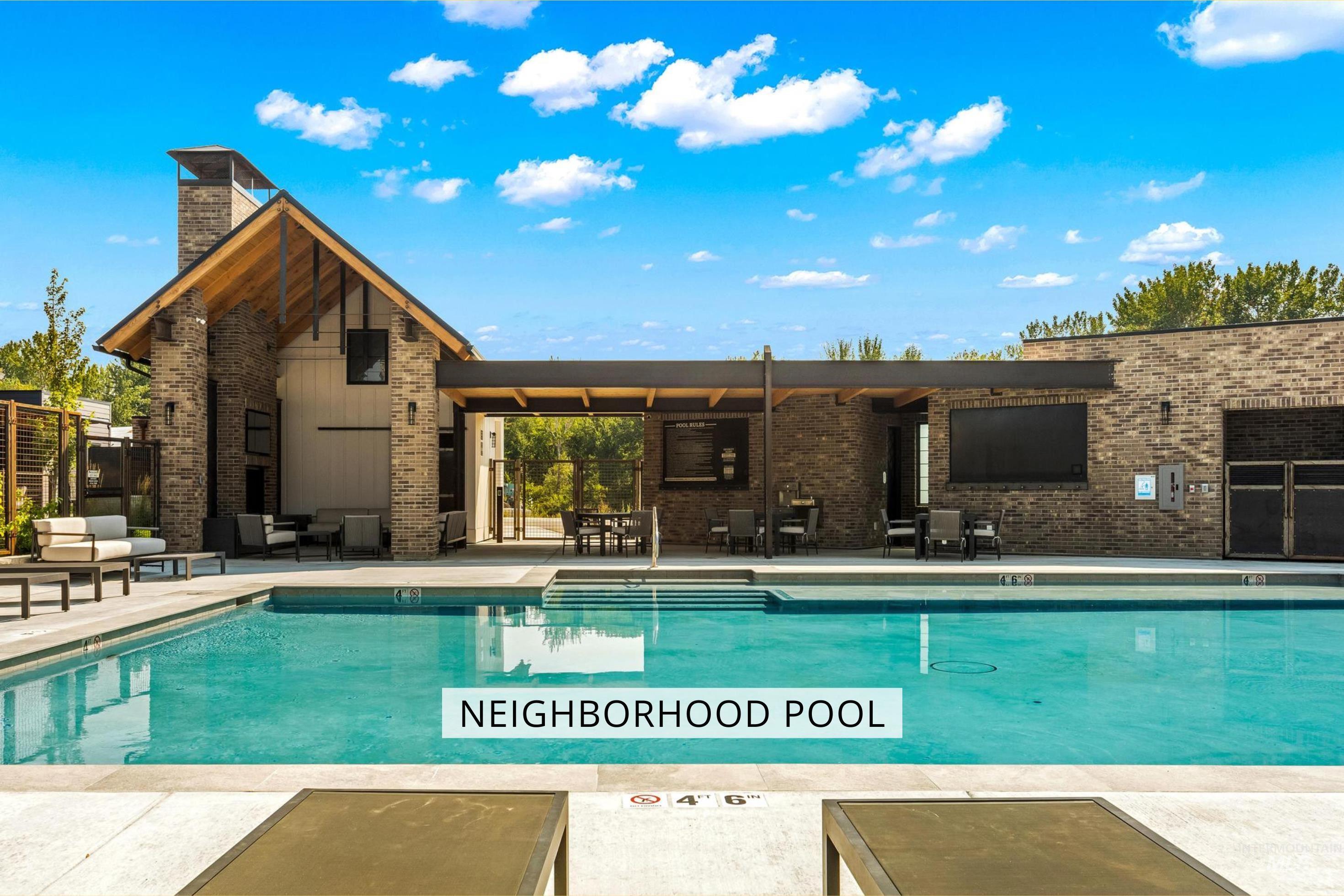 Community pool featuring a patio area