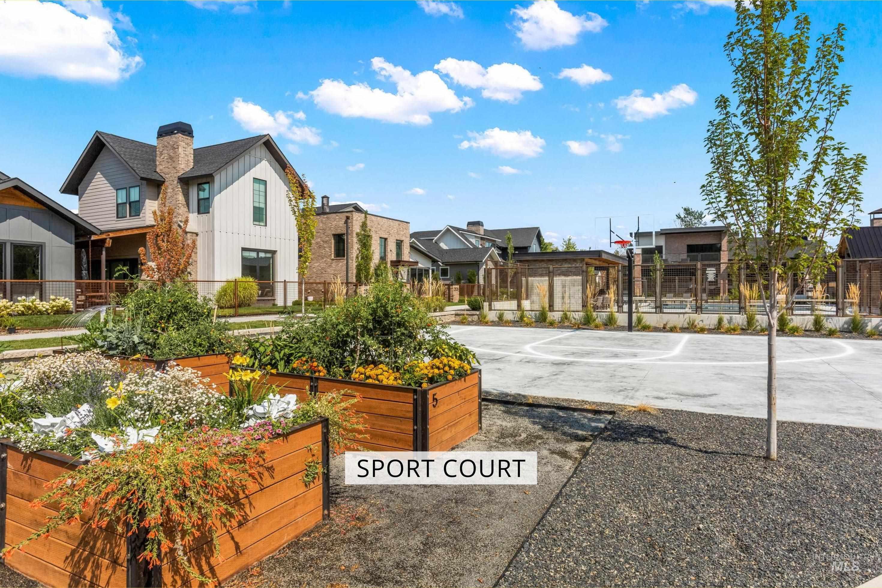 View of basketball court with community basketball court and a residential view