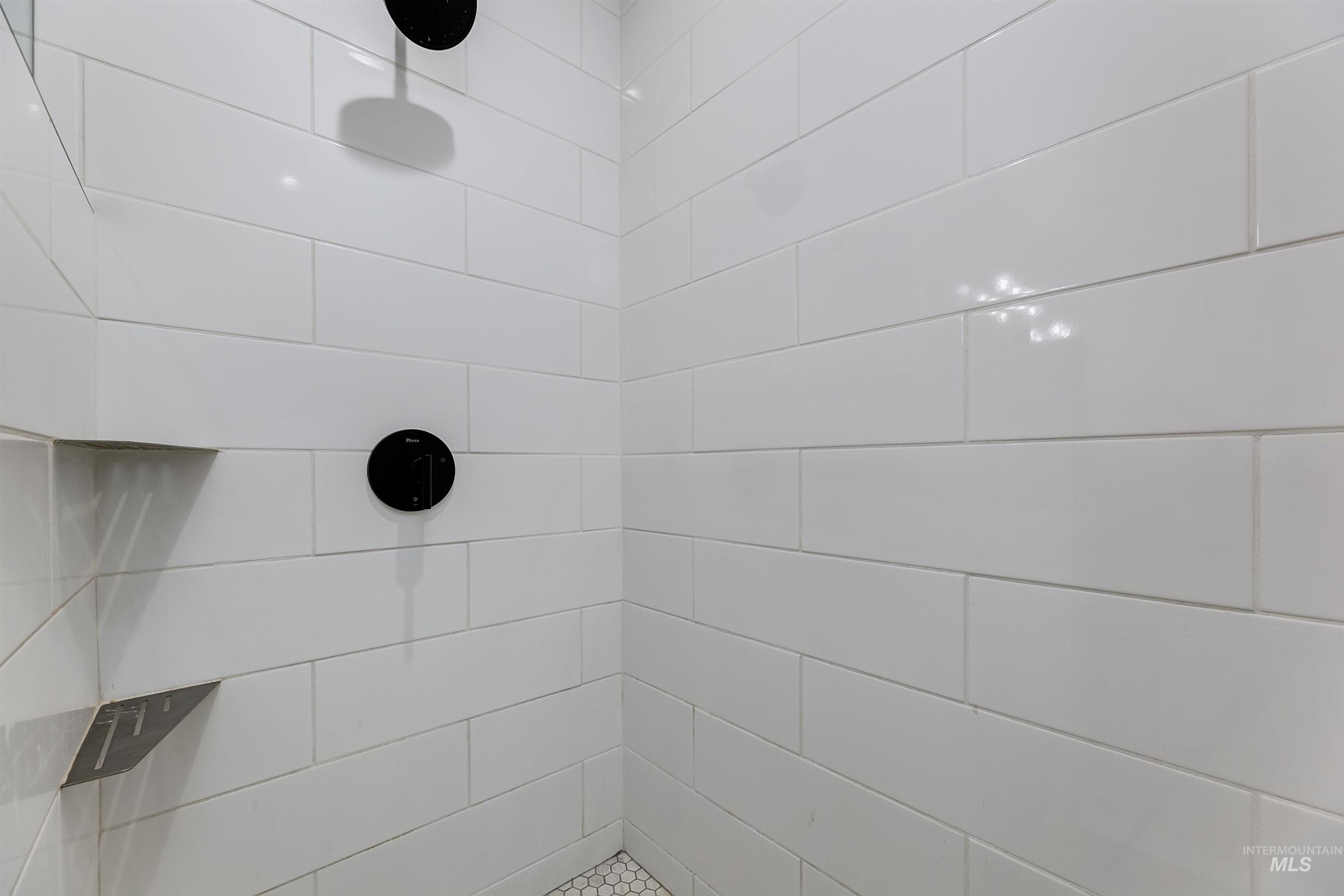 Bathroom with a tile shower