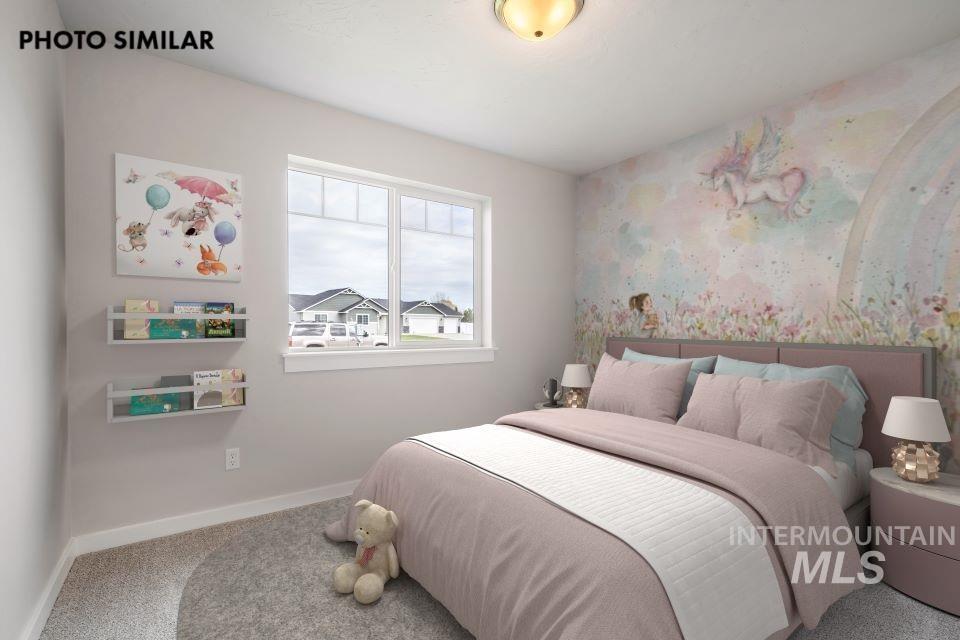 Bedroom with carpet and wallpapered walls