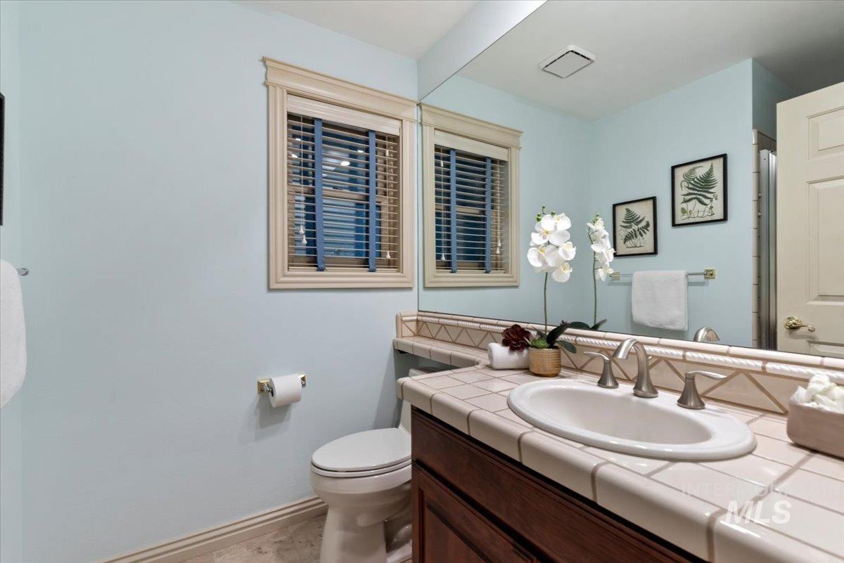 Bathroom with vanity and toilet
