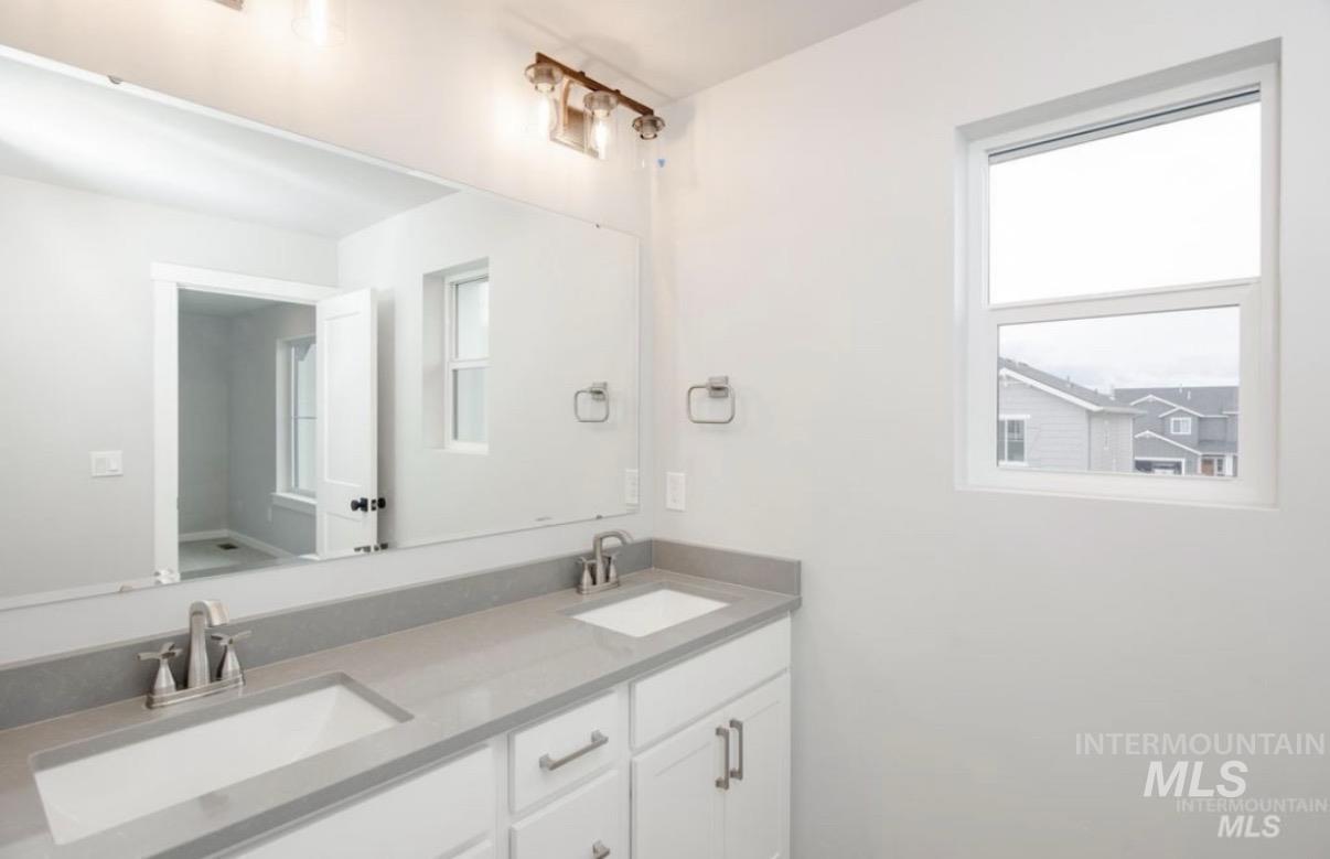 Full bathroom with double vanity