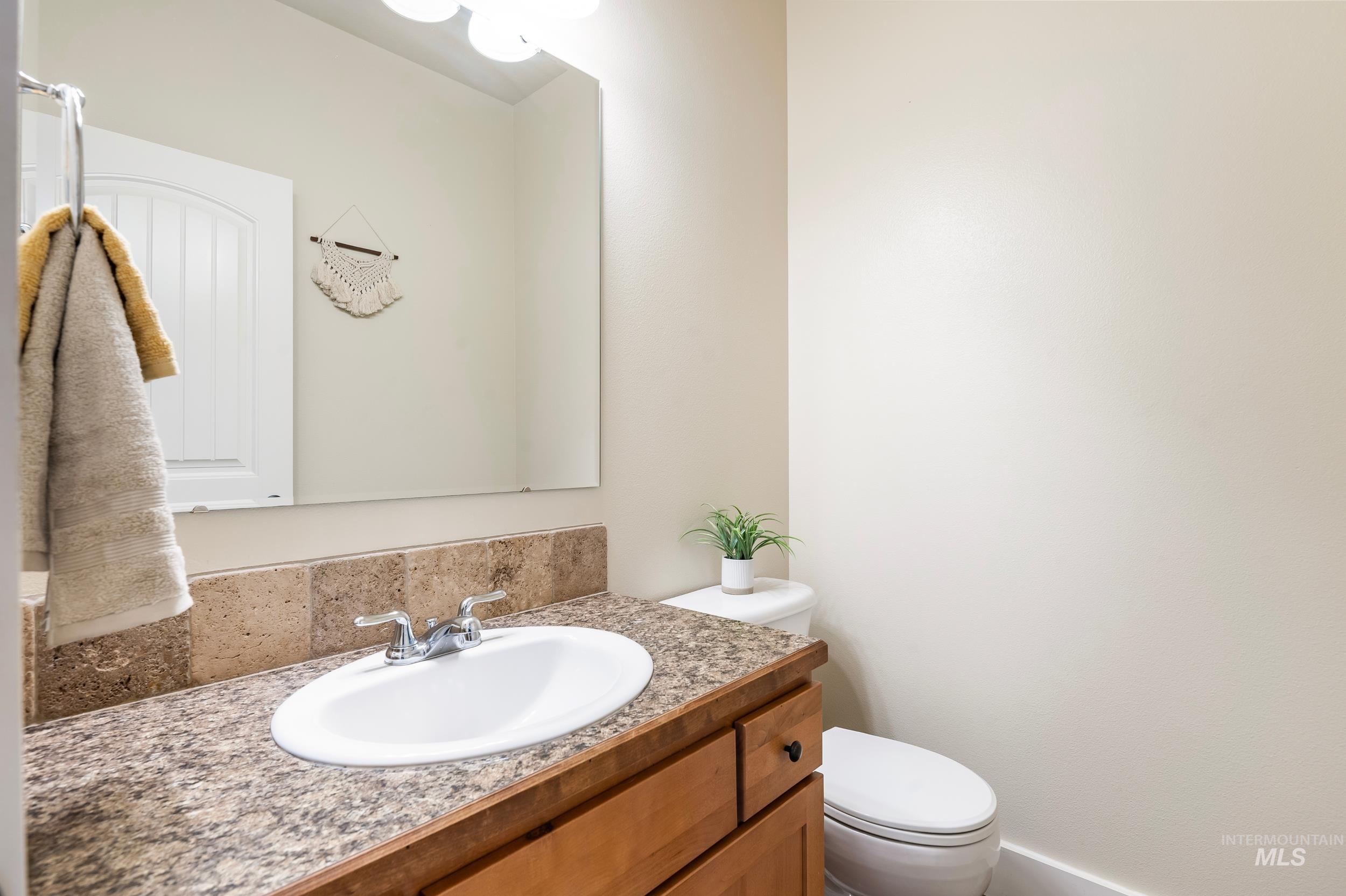 Bathroom with vanity and toilet