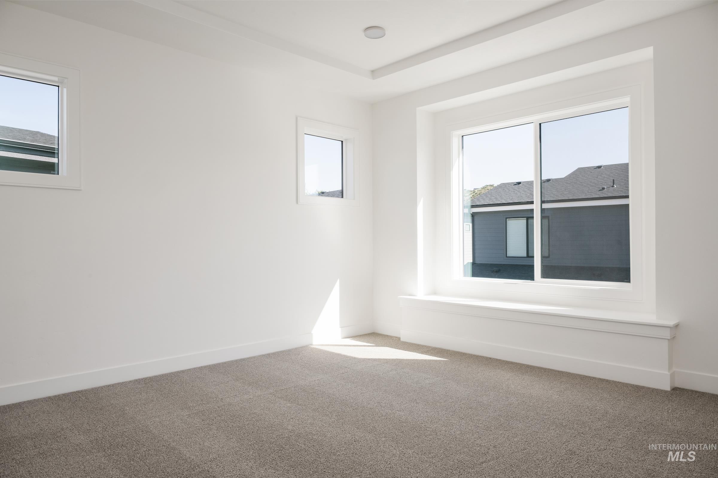 Unfurnished room featuring carpet