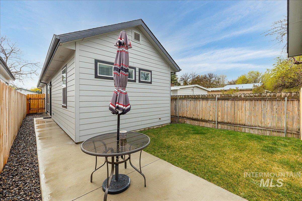 View of outdoor structure with a fenced backyard