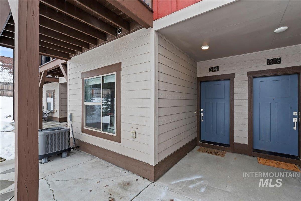 Entrance to property with a patio area