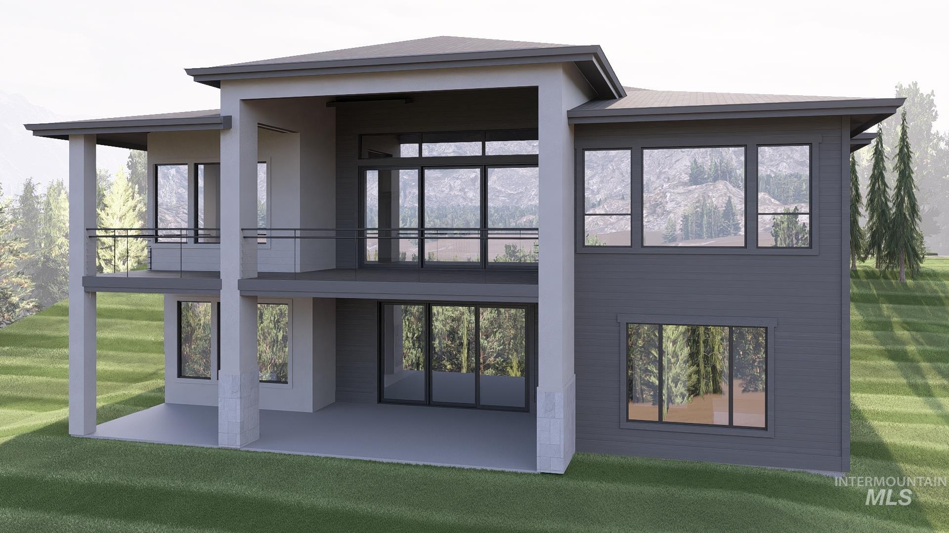 Rear view of property with a lawn and a patio