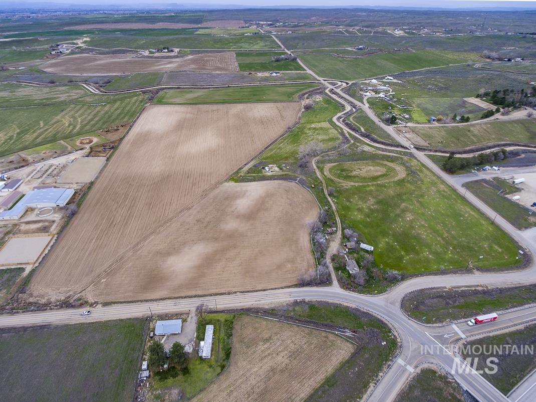 Aerial overview of property's location with abundant farmland and rural landscape