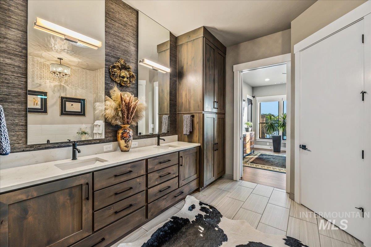 Bathroom featuring double vanity