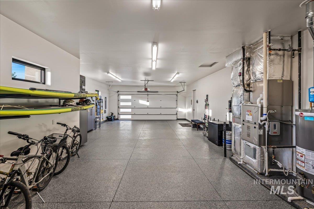 Garage with gas water heater and heating unit