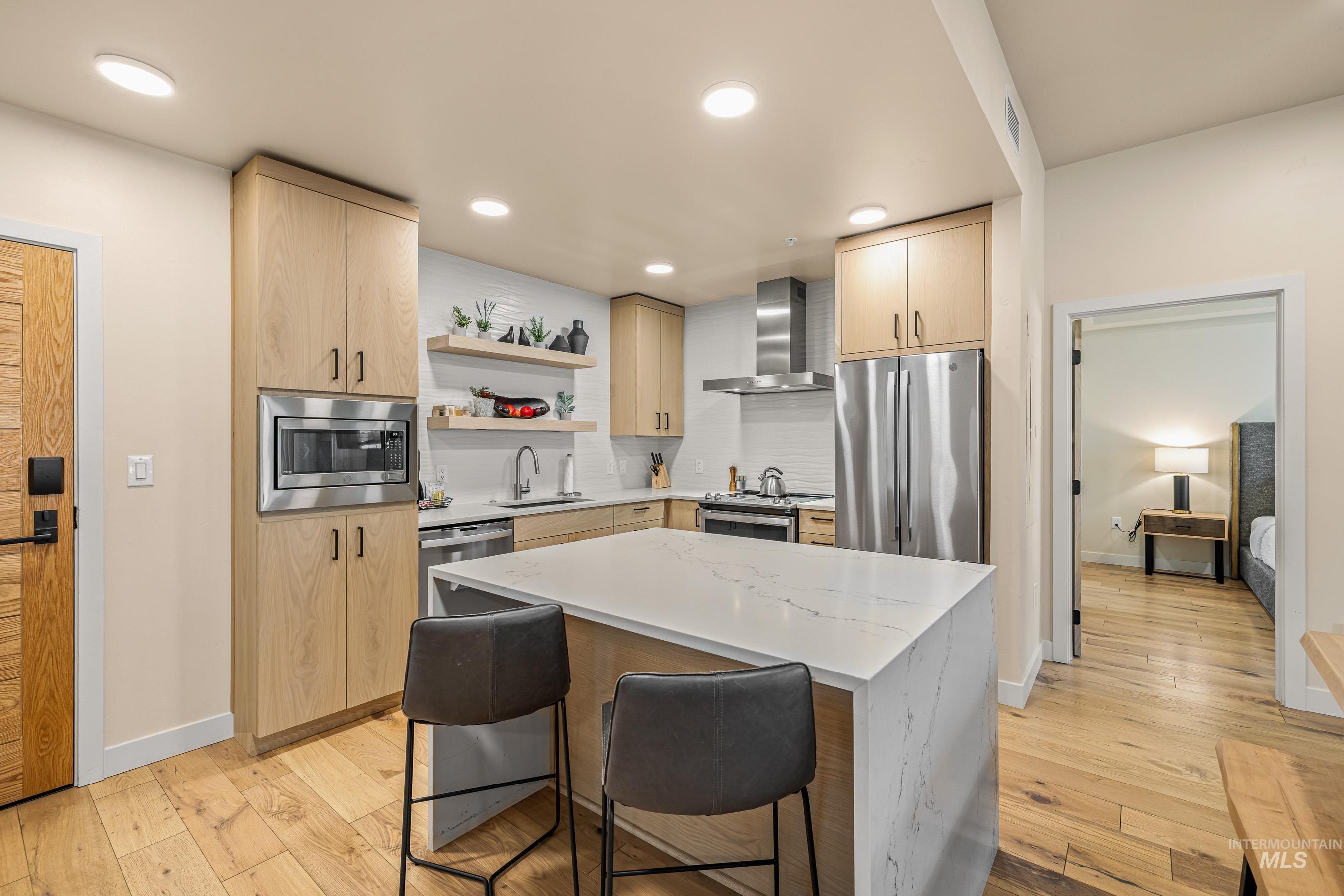 Kitchen with island eating area