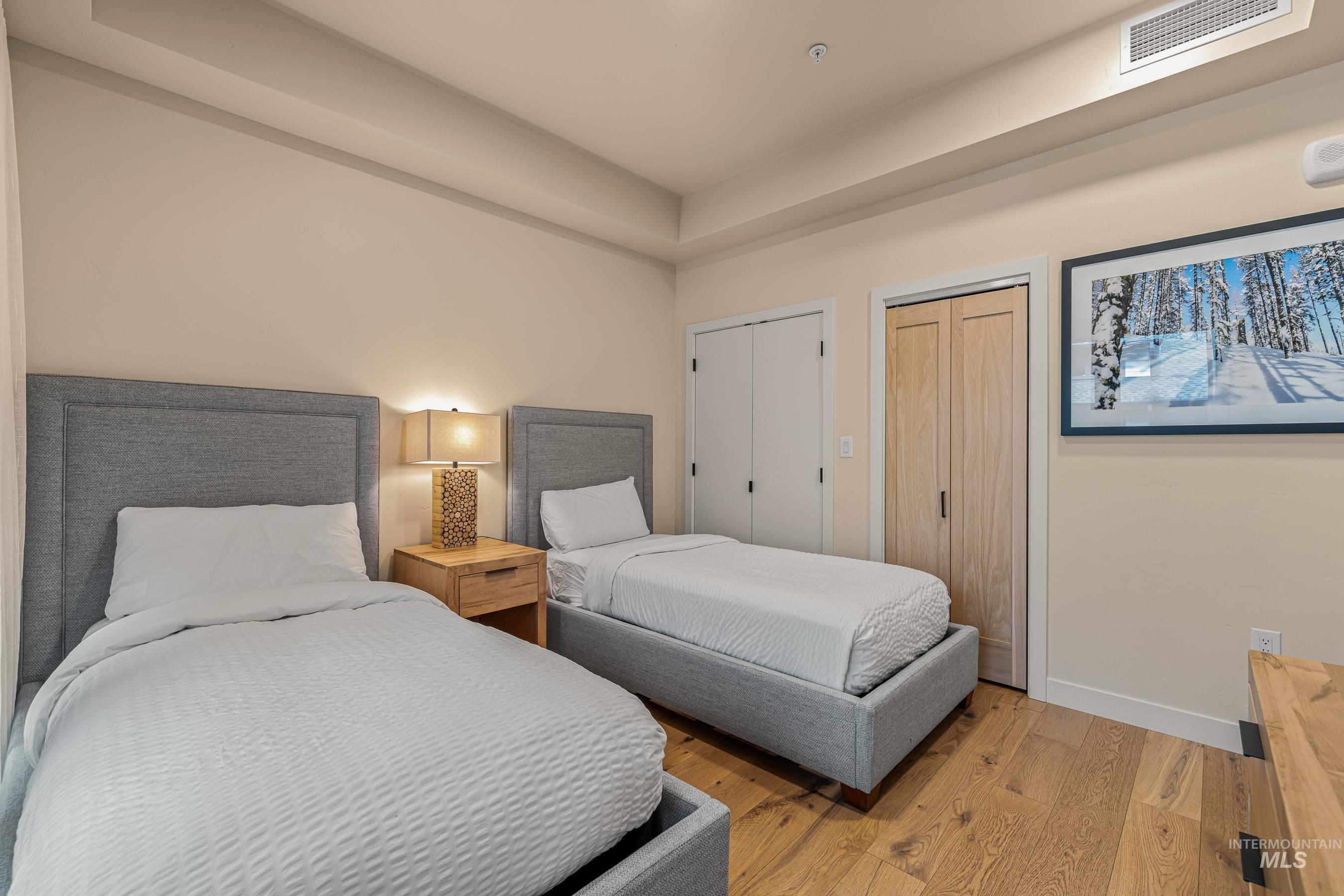 Bedroom featuring wood finished floors
