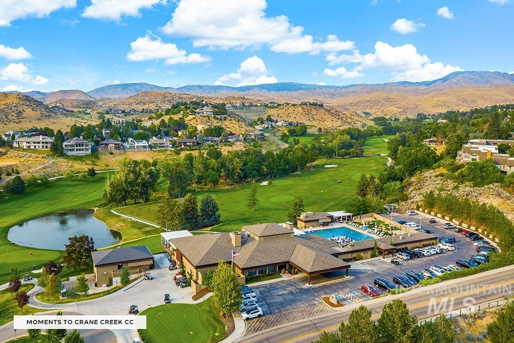 Bird's eye view of a water and mountain view and a local golf course